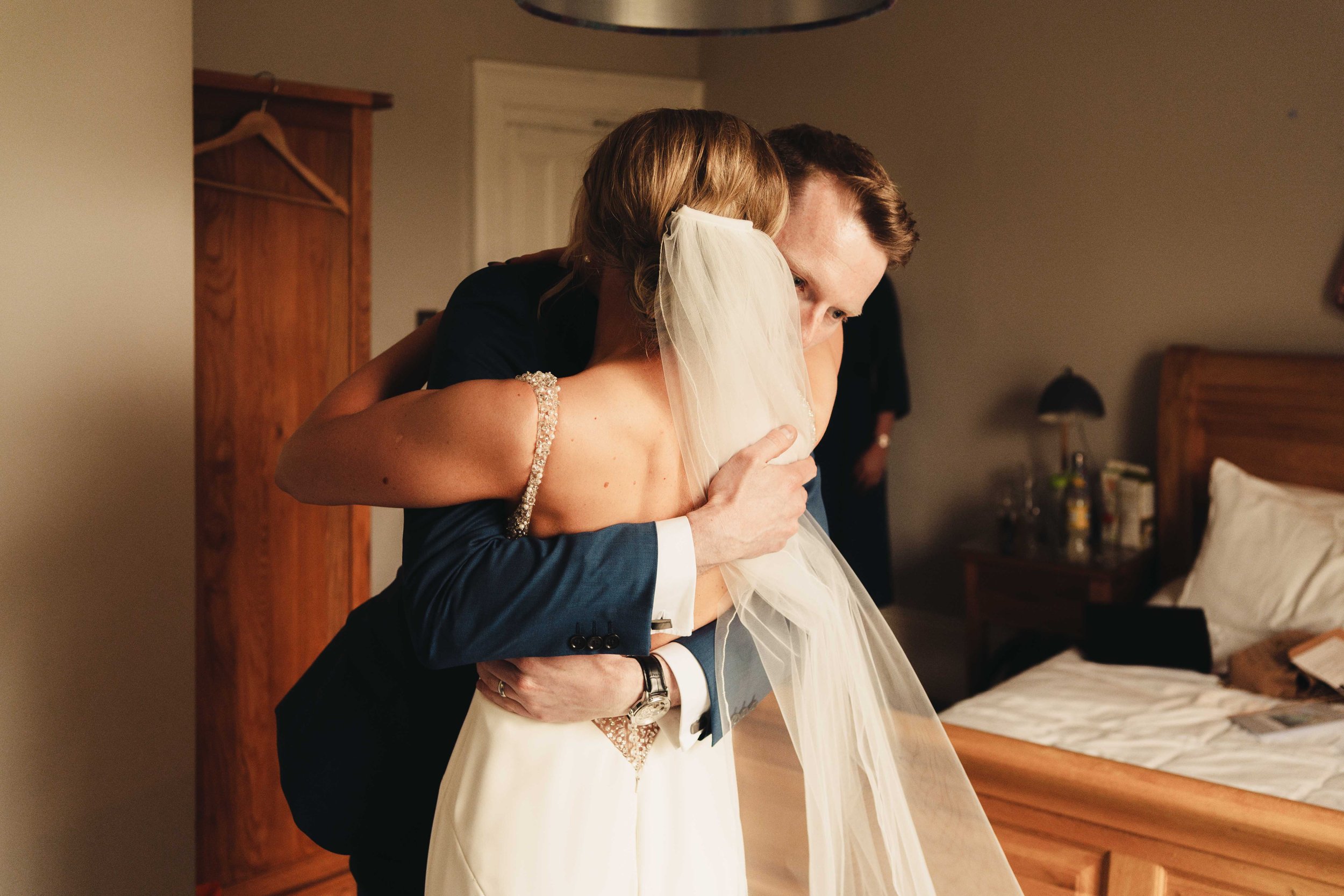 bride hugging her brother