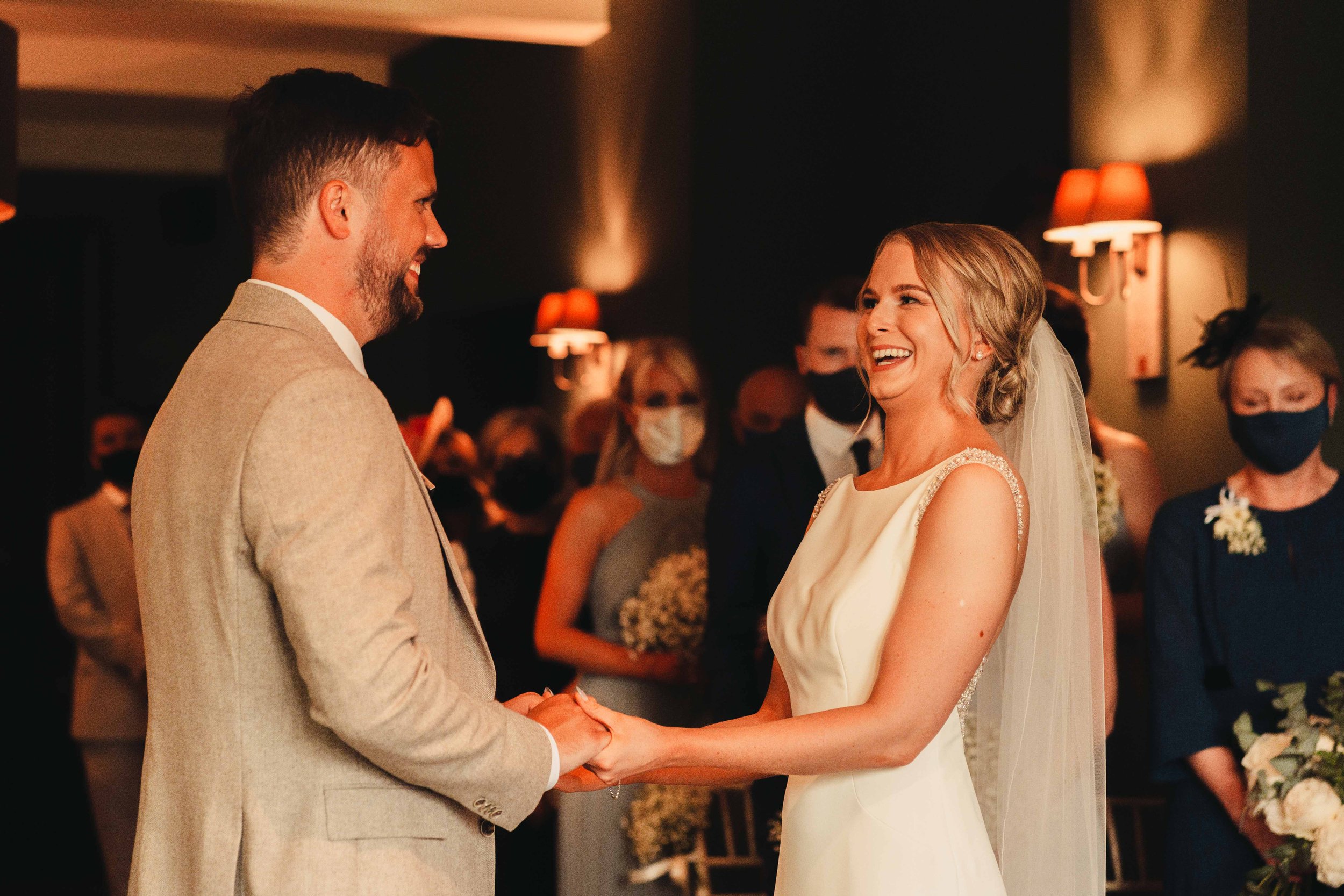 Bride and groom exchange rings