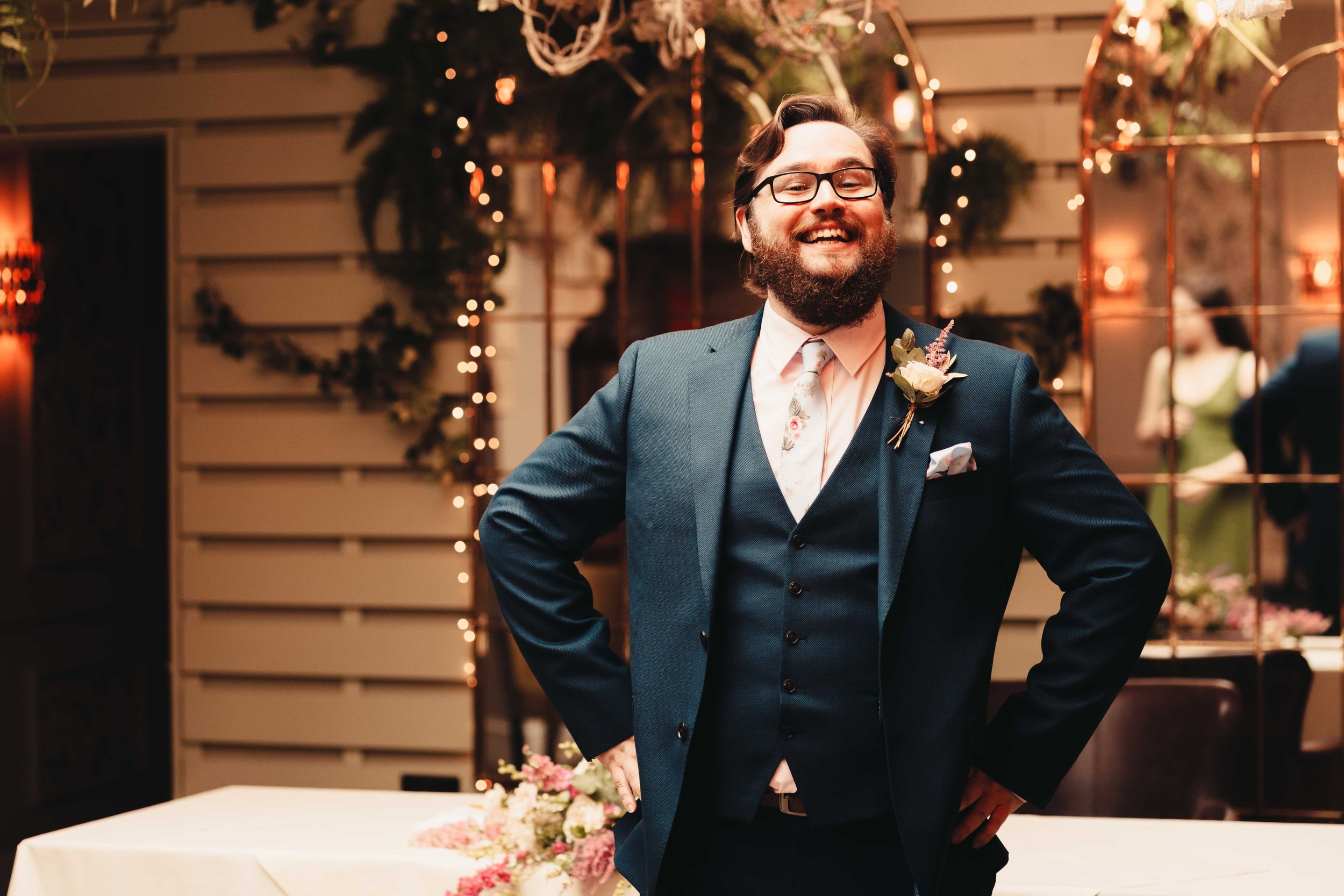 A very excited groom in the ceremony room