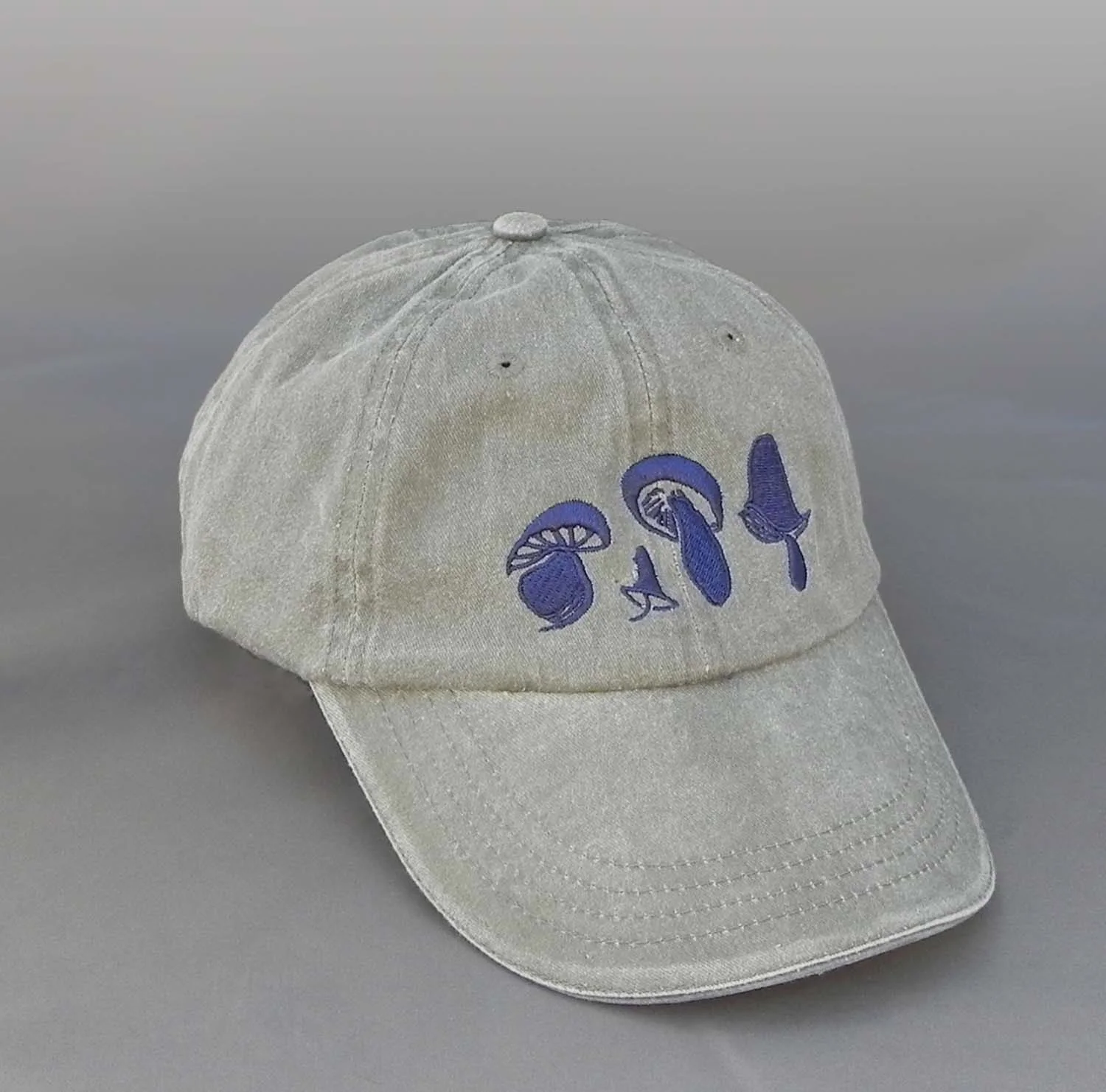 Taupe colored Baseball Cap with Navy Embroidery.