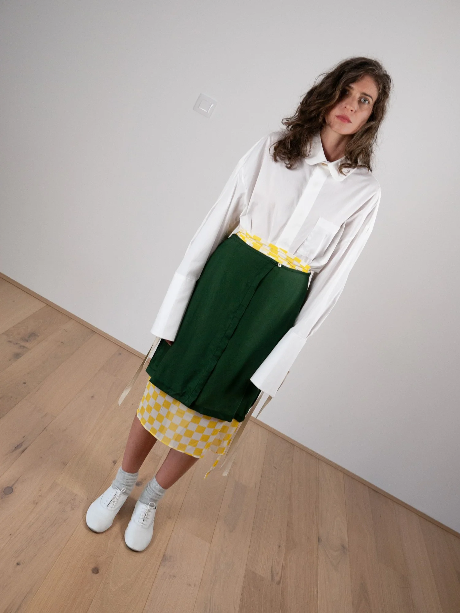 Green wrapped skirt. Cupro.