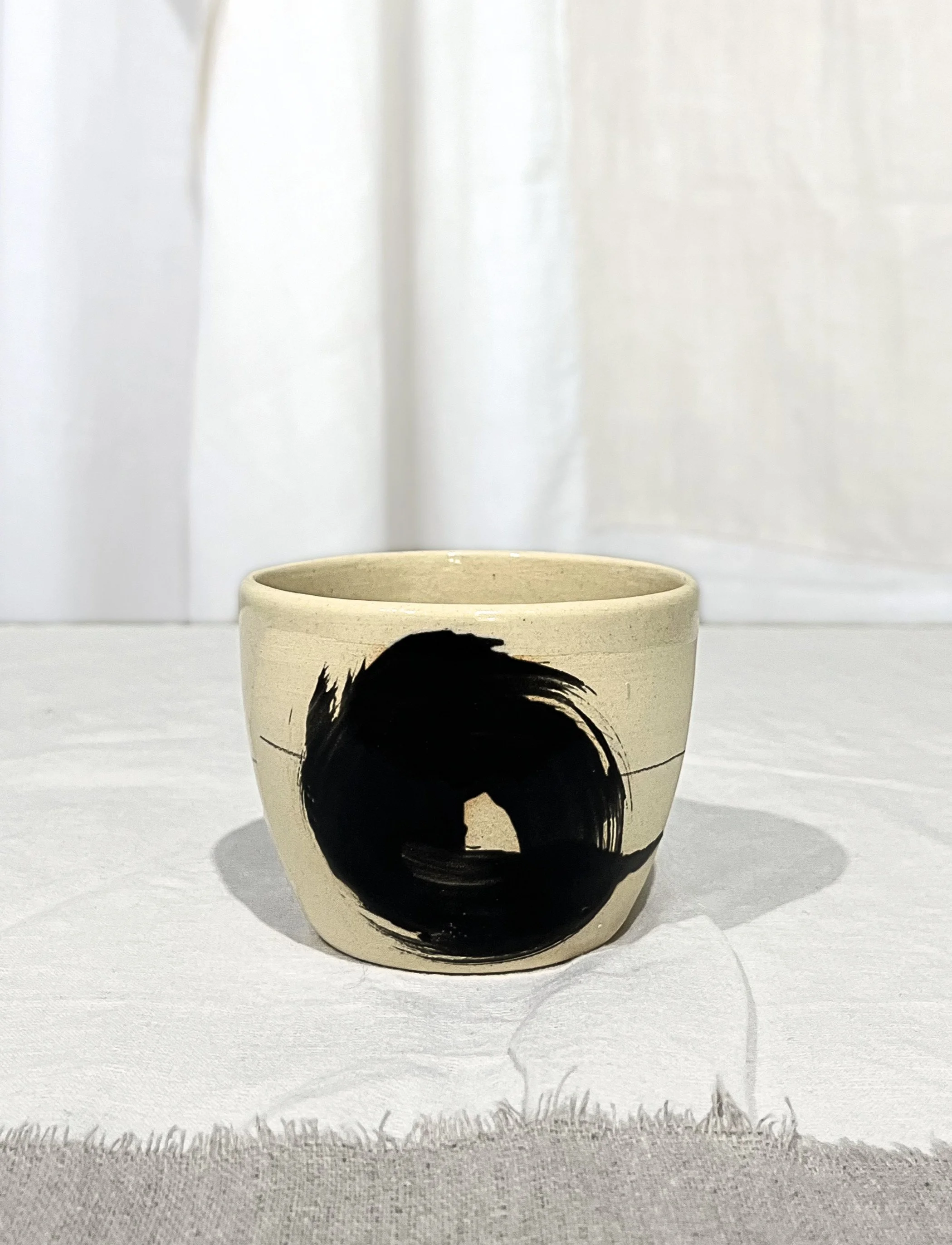 Stoneware handmade cup. Brush stroke.