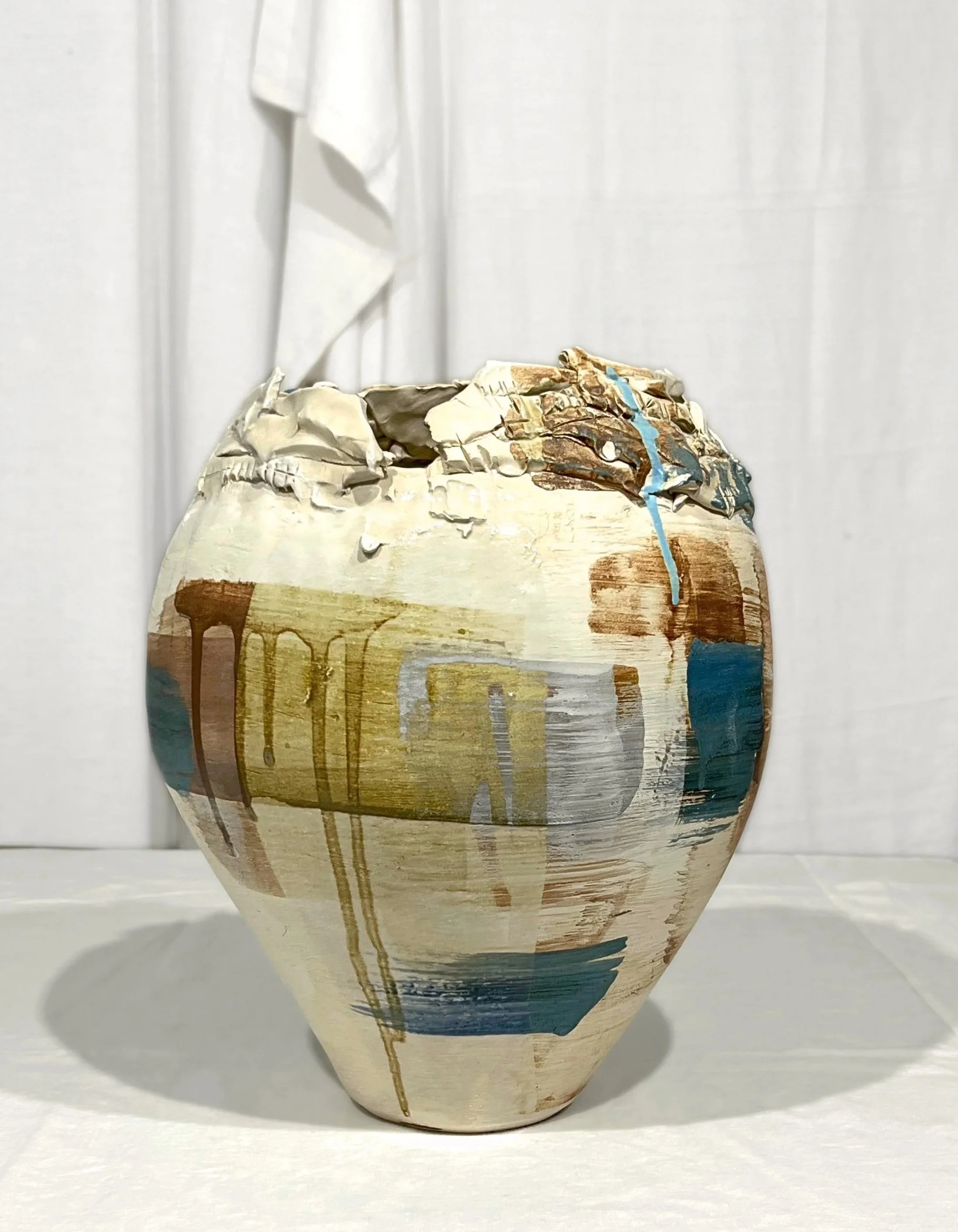 Vase Pigments. Handmade clay vase.