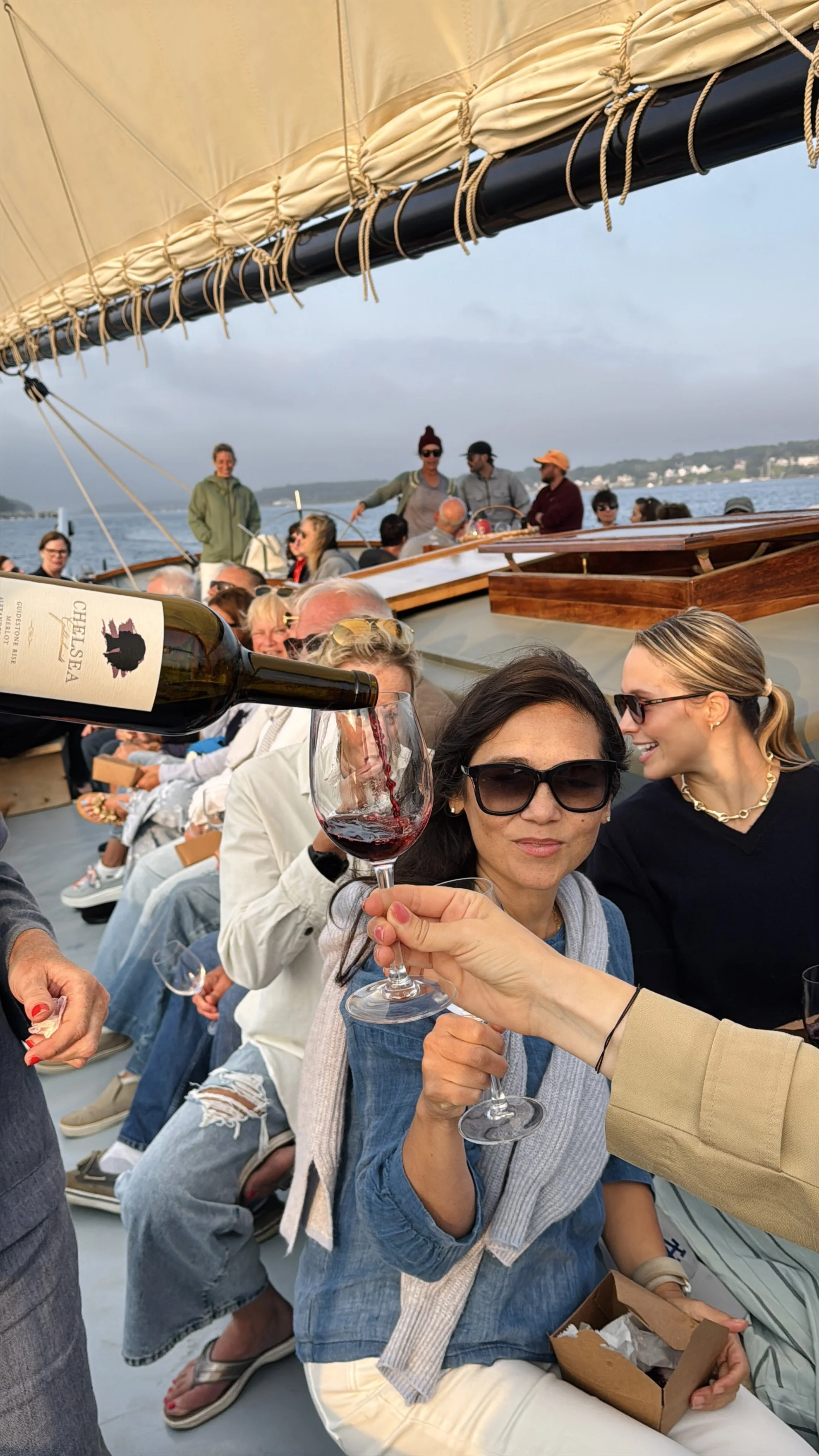 Wine_Wise_Sail_September_Portland_Maine_Napa_Sonoma_2025_merlot_pour_red_woman.jpg
