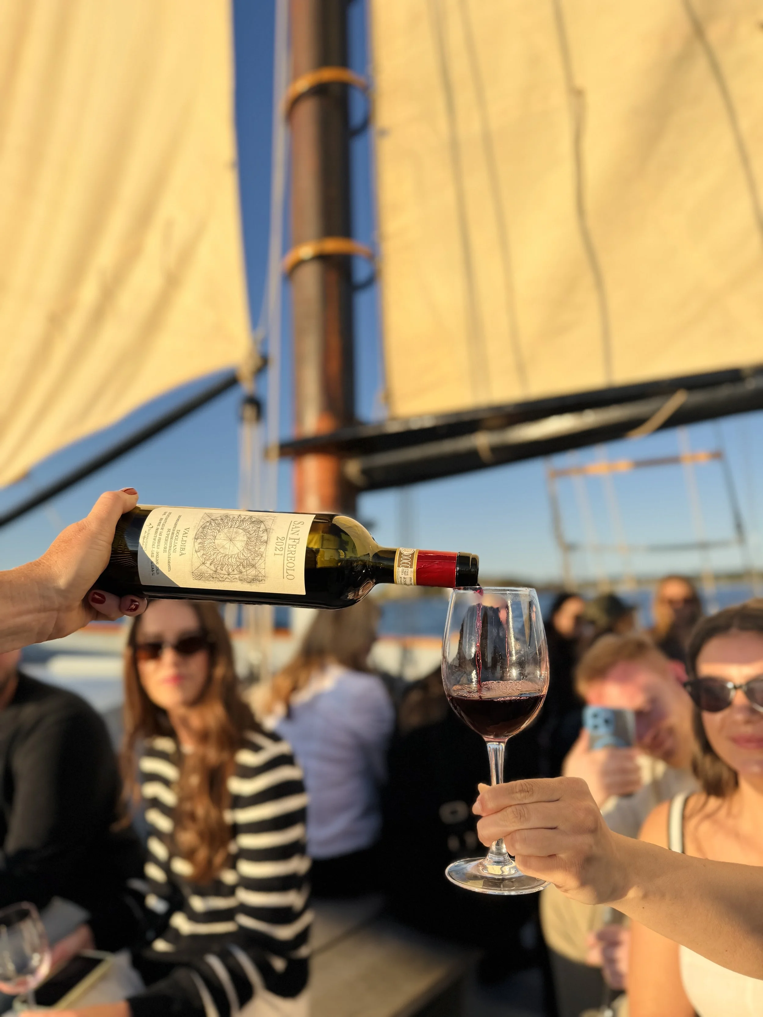 Wine_Wise_Sail_September_Portland_Maine_Piedmont_sunset_pour_red_dolcetto_people_2025_.jpg (Copy)