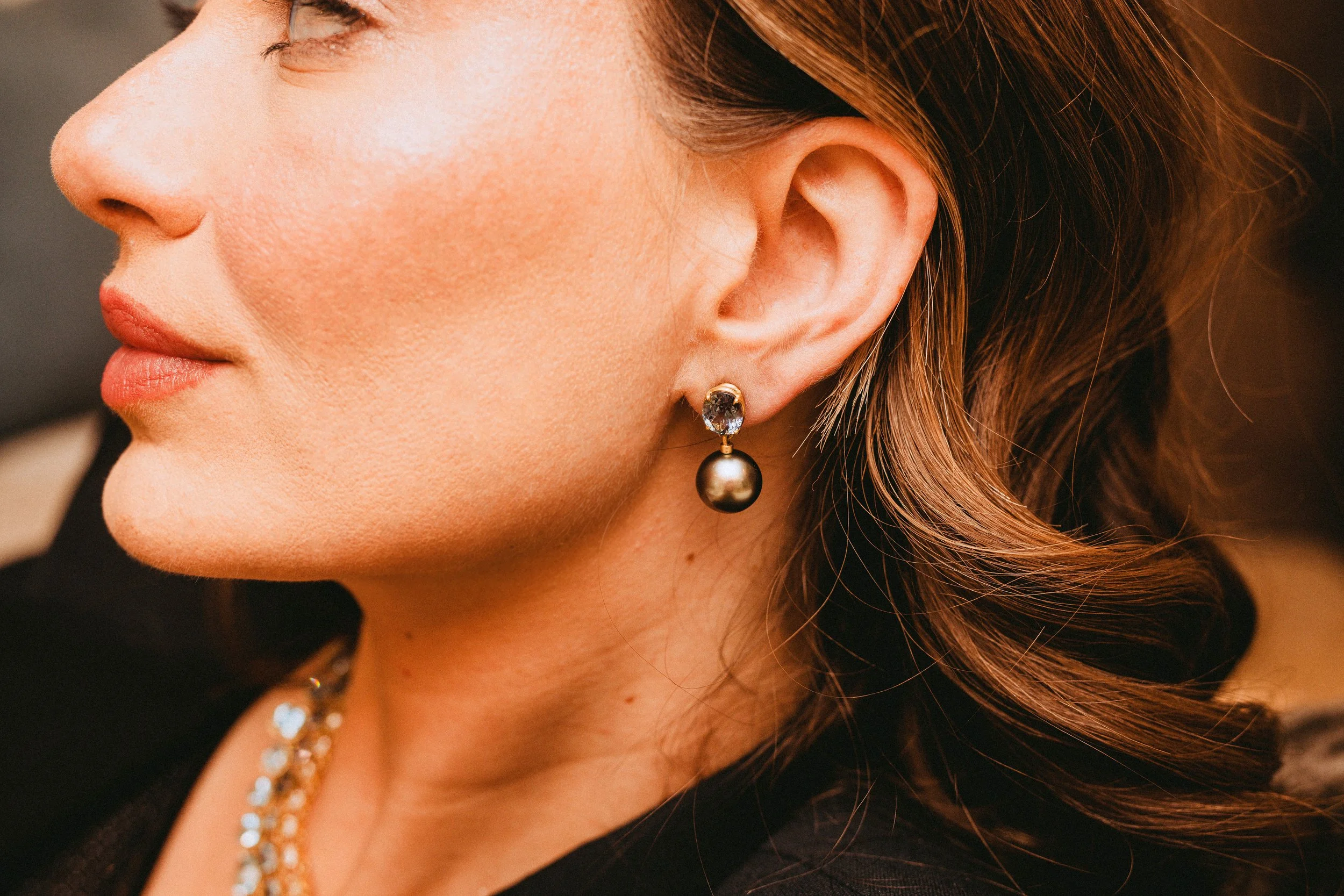 Model wearing Leigh Maxwell Zoisite & Tahitian Pearl Earrings