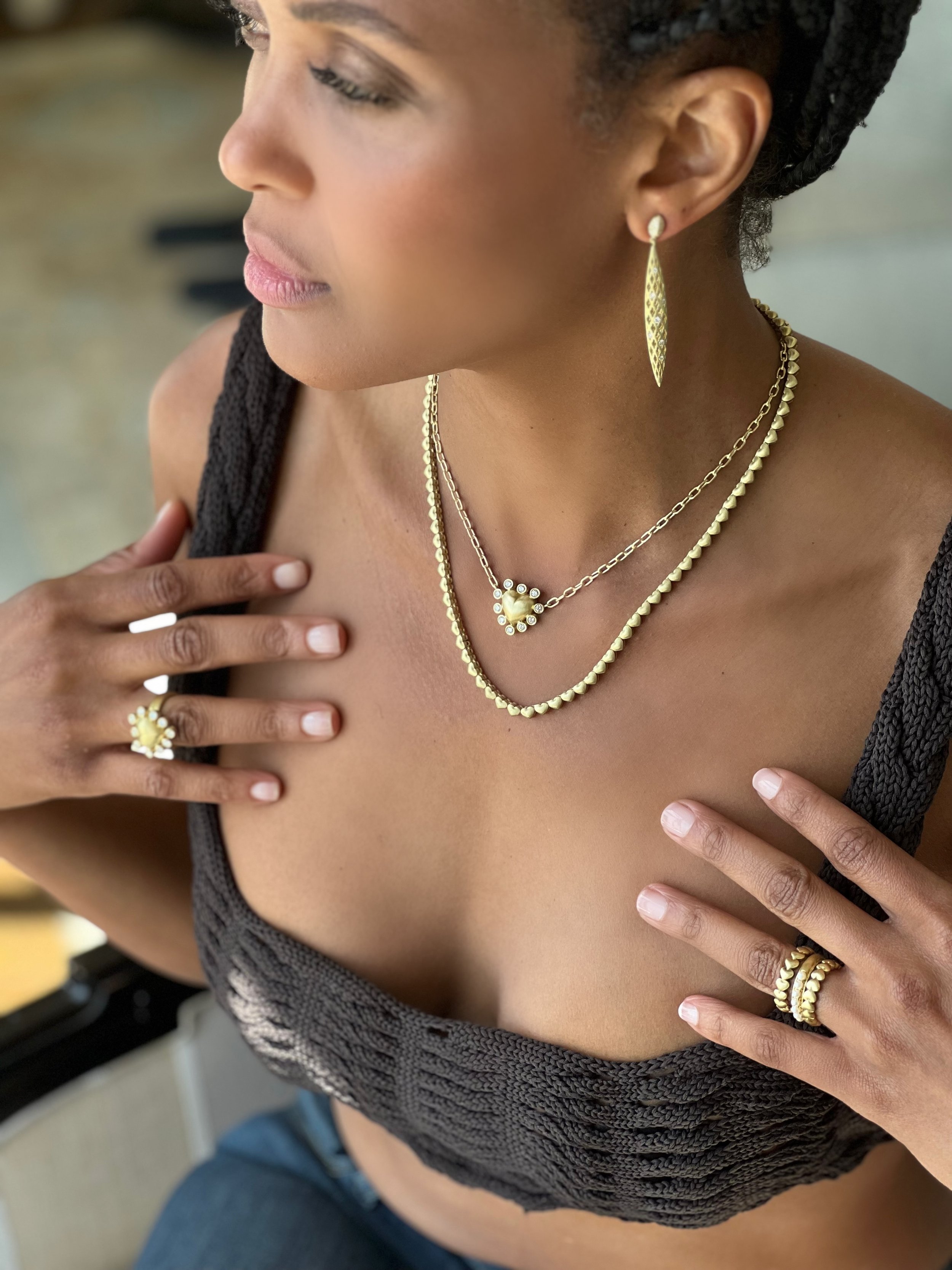 model wearing Leigh Maxwell puffy heart necklace with bezel set diamond halo (Copy)