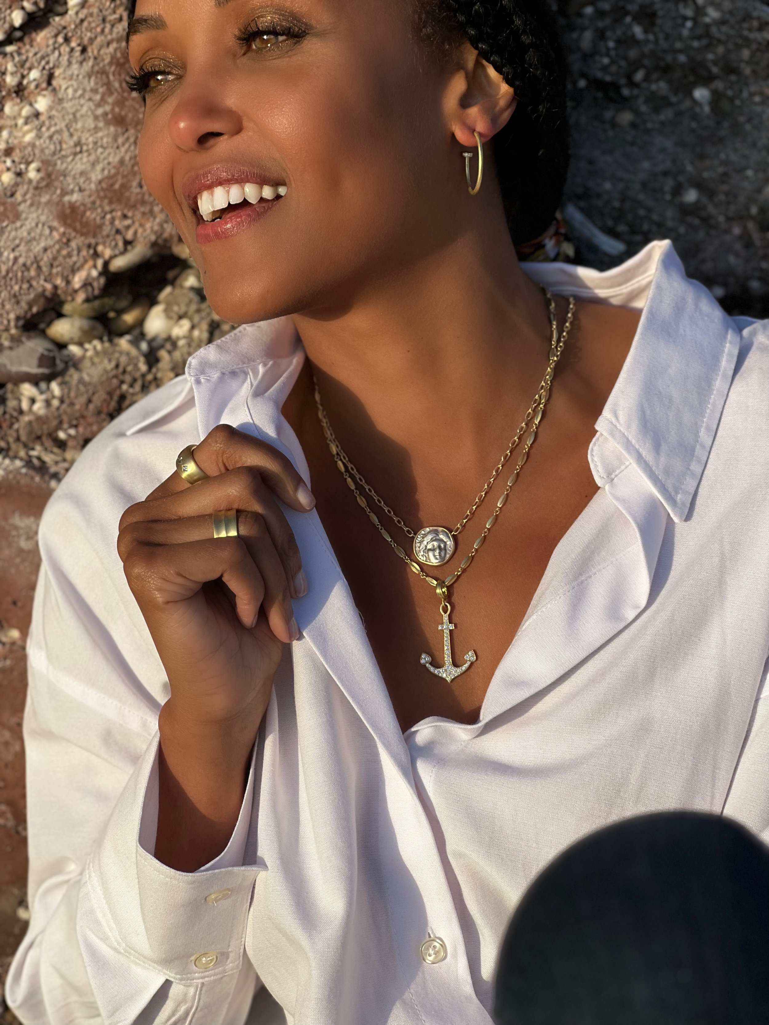 Model wearing Leigh Maxwell continuous pod necklace with pendant