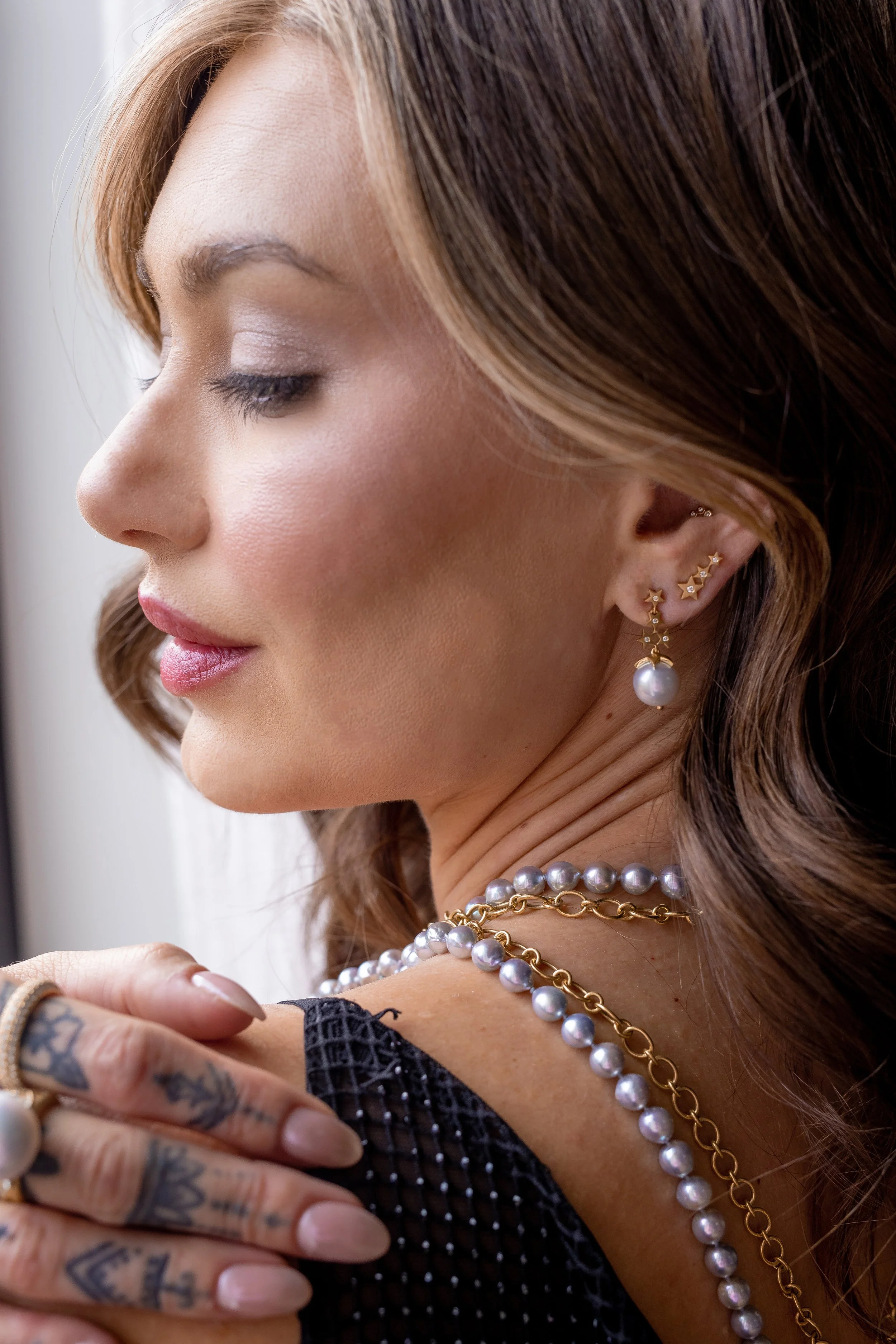 Model wearing Leigh Maxwell Starstruck Ear Climber Studs - Diamond