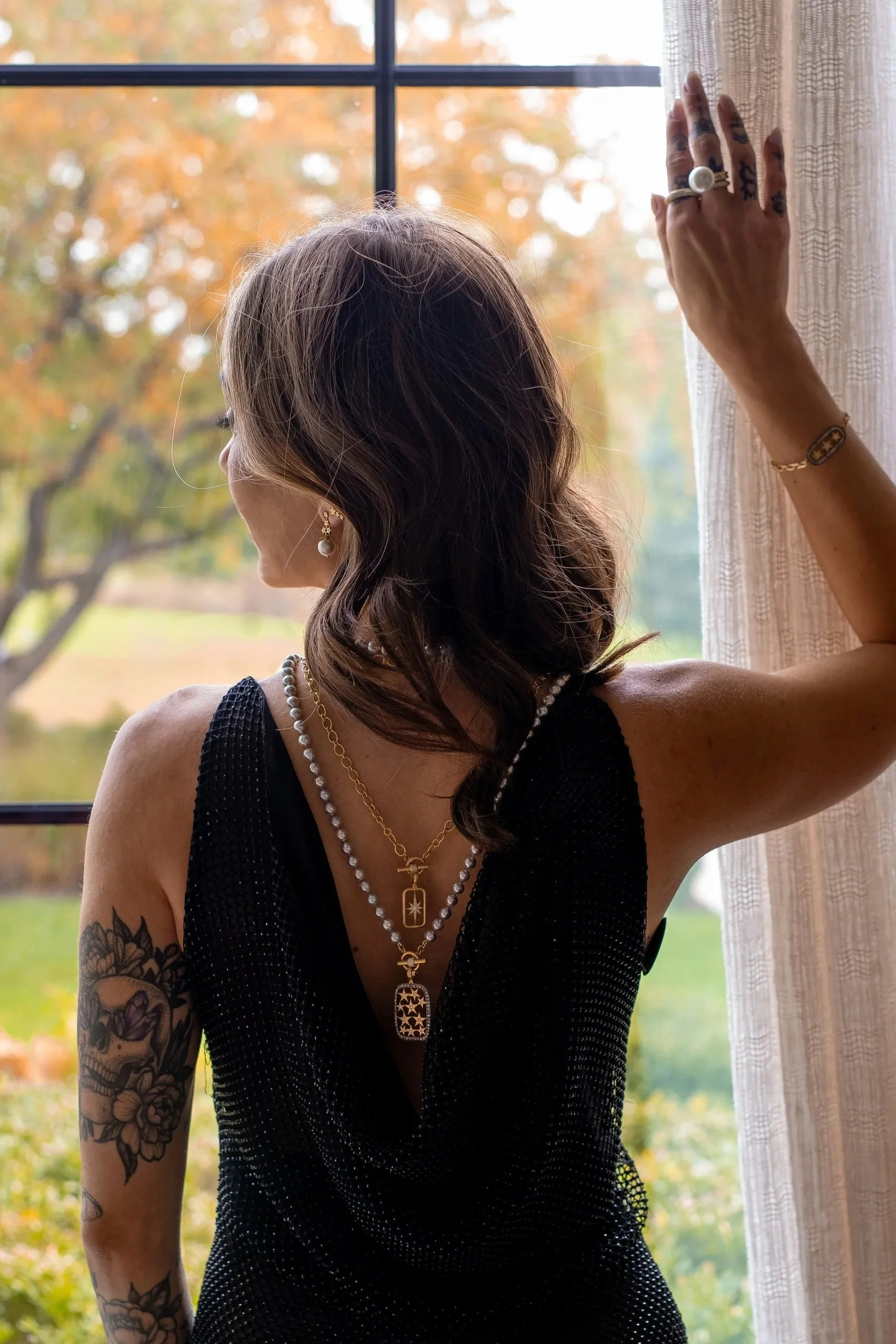 Model wearing Leigh Maxwell Starstruck North Star Pendant- Diamond