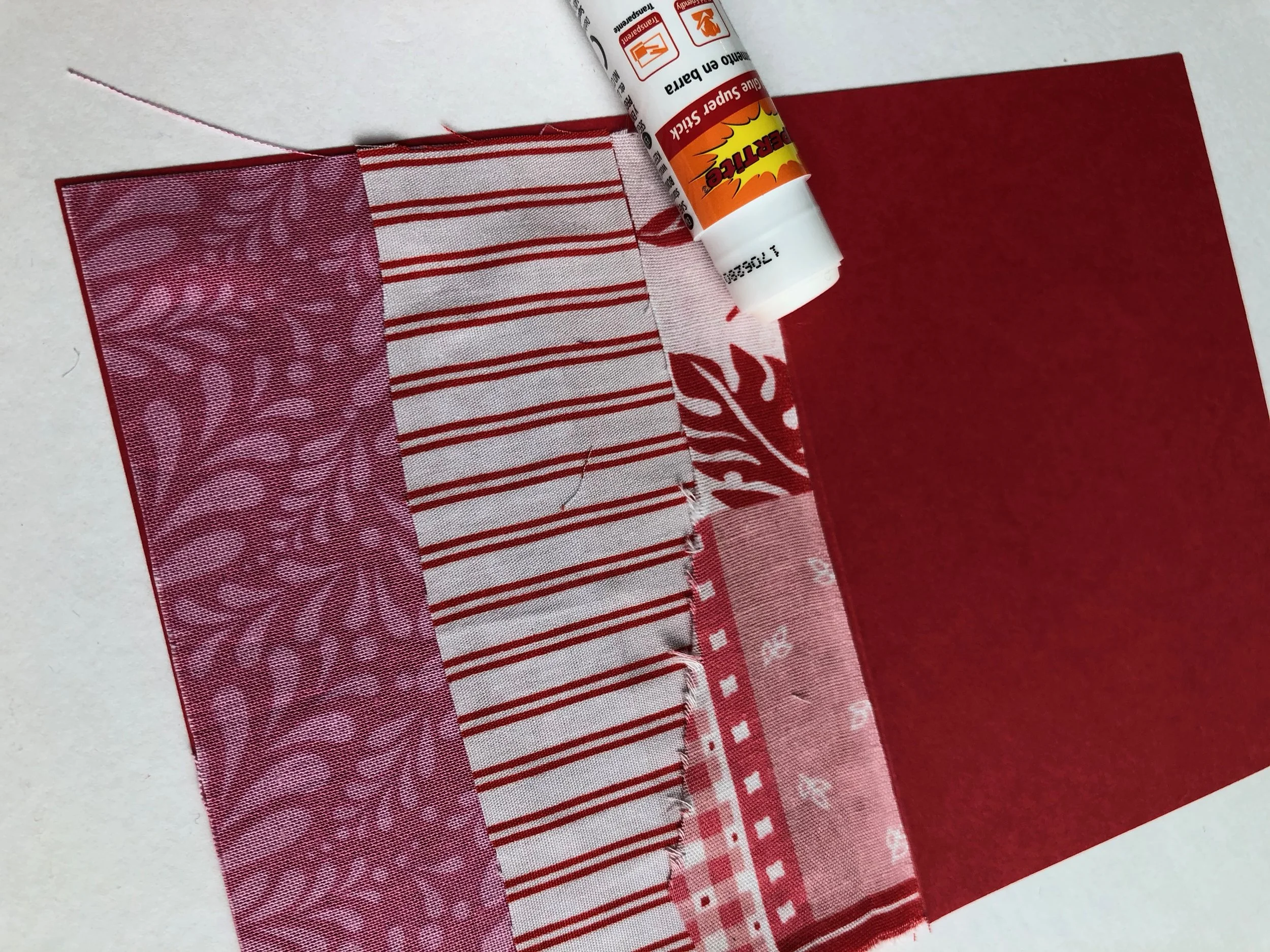 gluestick-applying-fabric-to-card.jpg