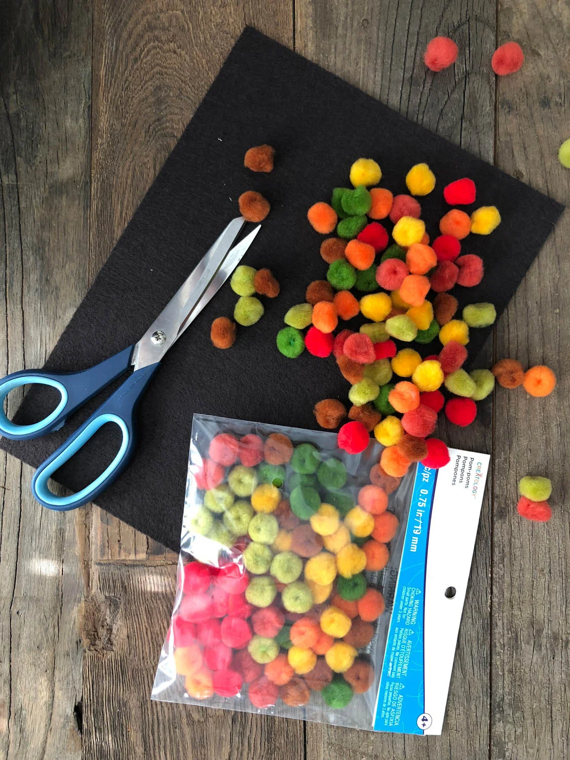 Simple supplies needed for DIY felt and pom-pom coaster