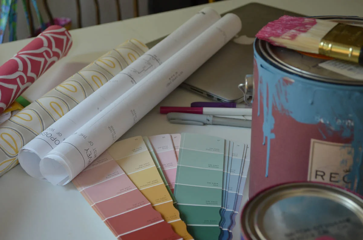 Colors swatches, wallpaper and paint samples for redecorating house flip