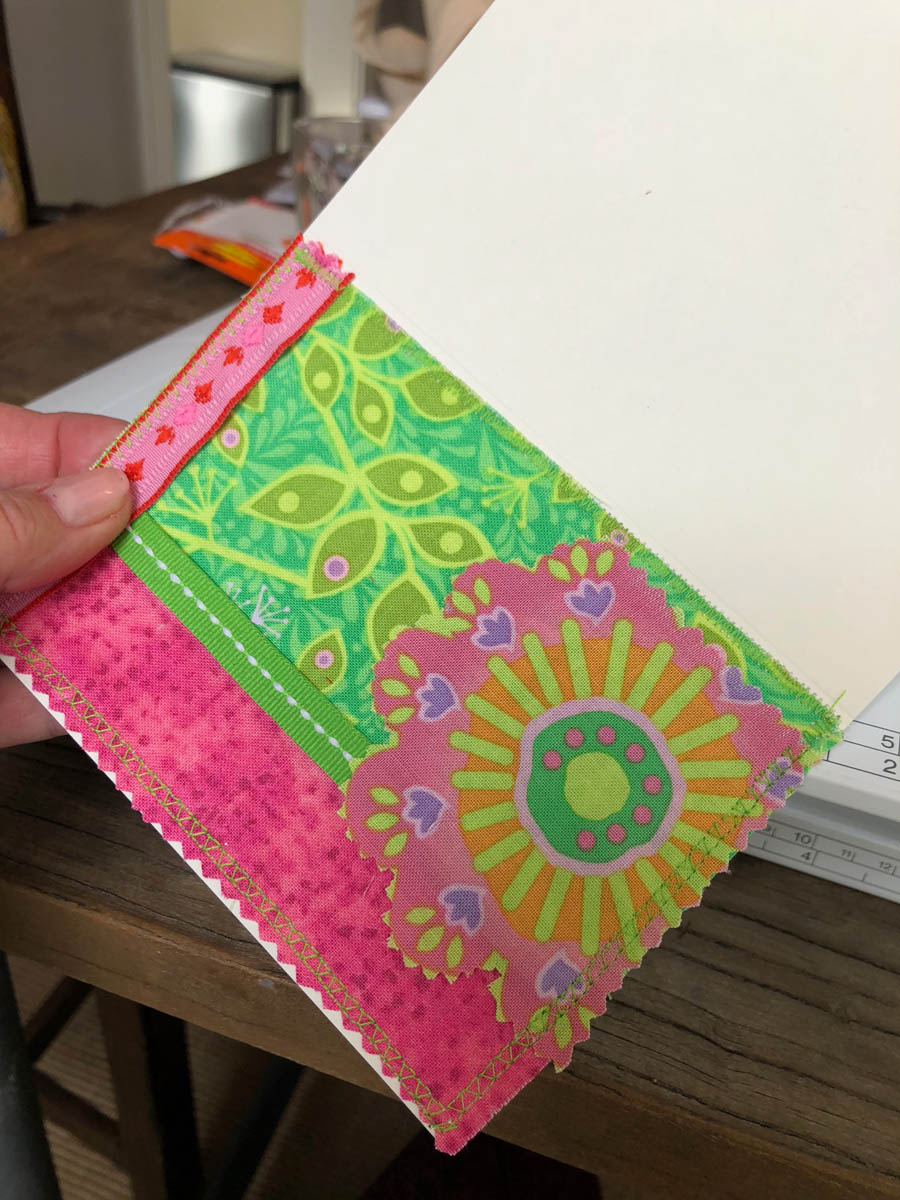 Close-up of fussy-cut fabric shape on hand-made embellished spring Easter card