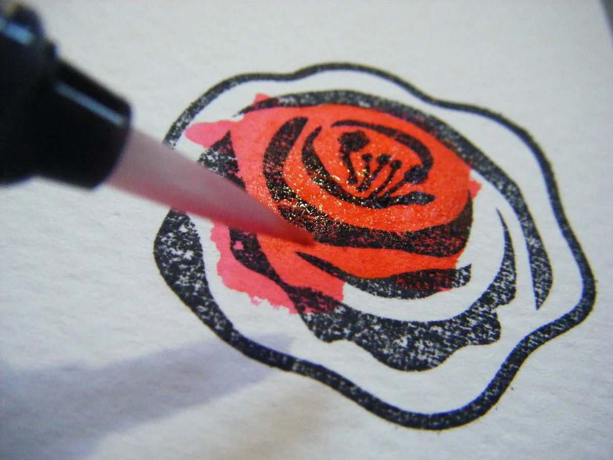 Add color to stamped rose design