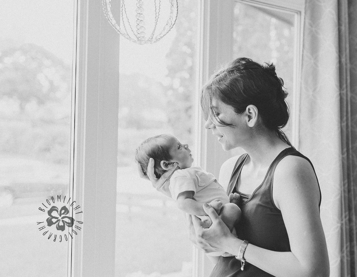 A mom looking at her baby boy at home in Markham.