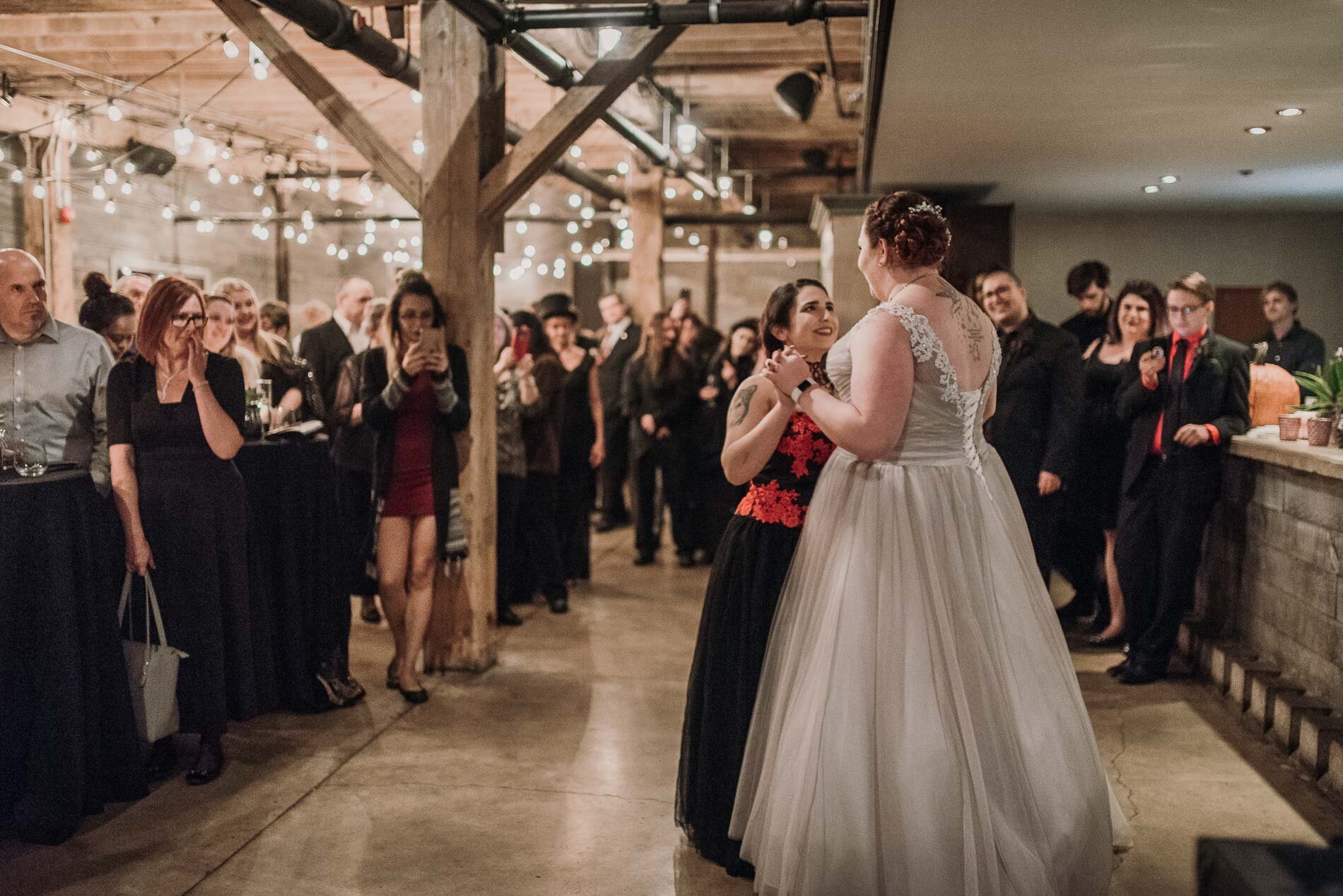 First dance of two brides at the loft in the Distillery, Toronto