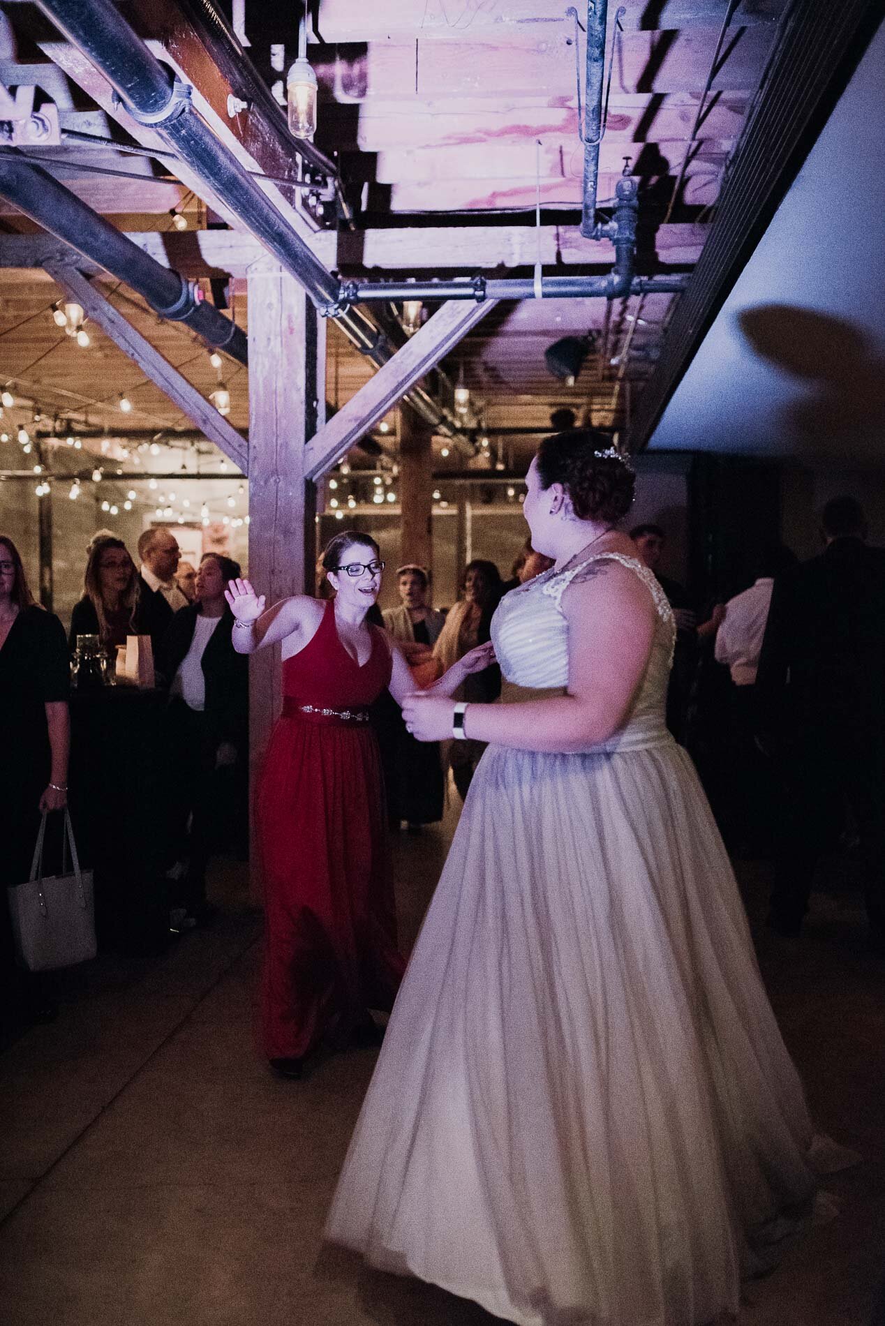 Photo of a bride dancing at her wedding 