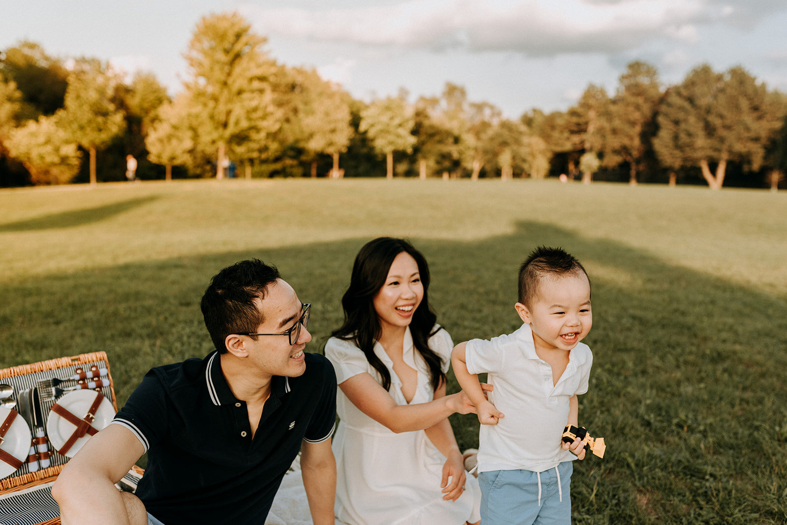 family photography in summer at a park during sunset
