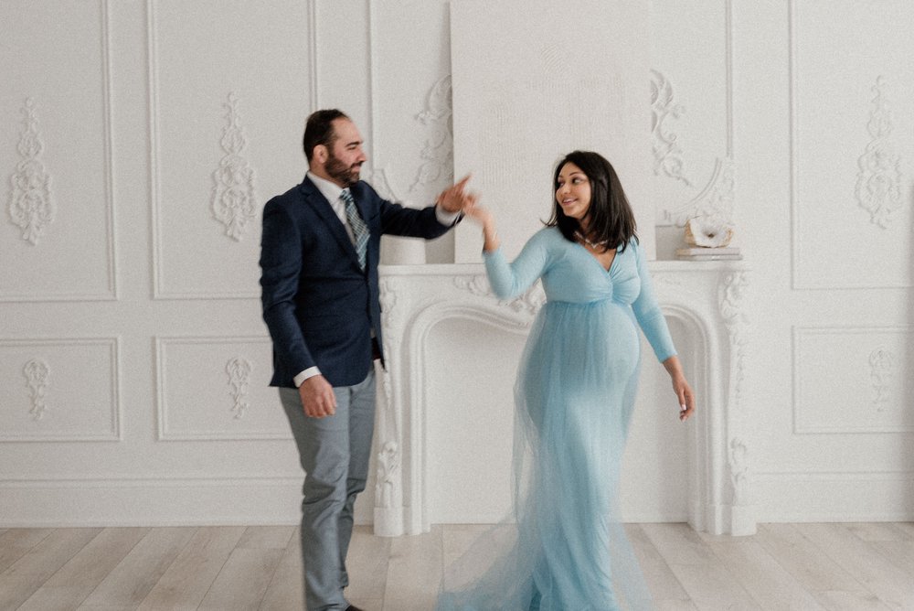 pregnant couple dancing in a studio, Toronto