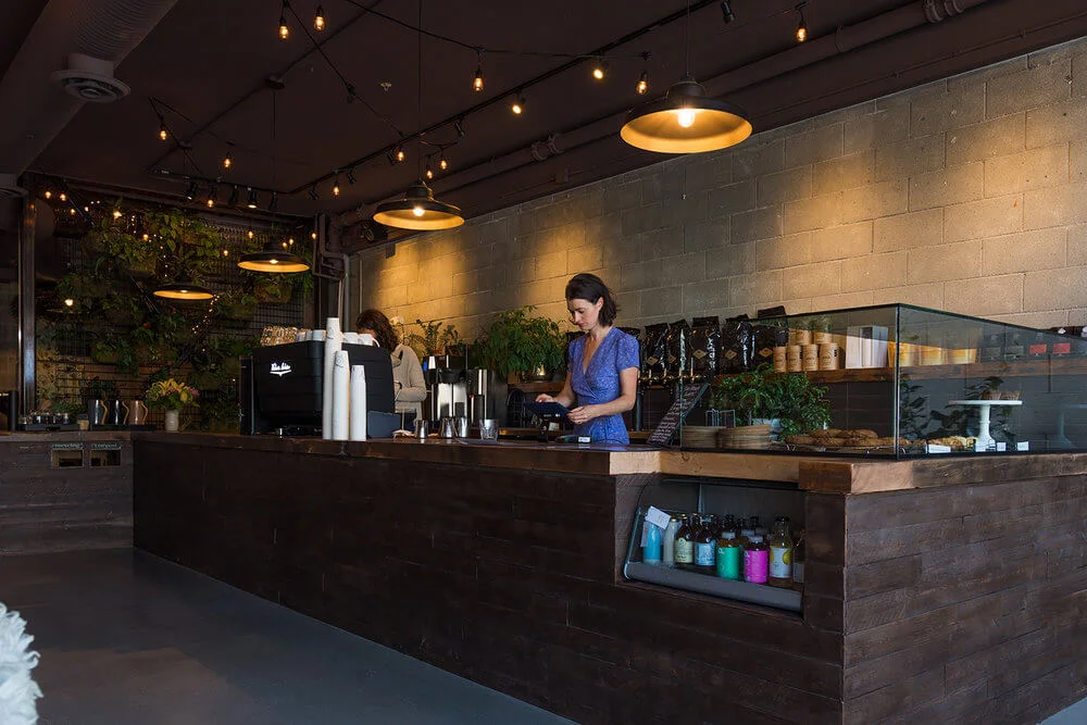 Stepping inside, The Garden’s dark wood cafe bar welcomes you.