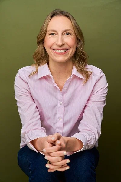 AVotaw_Headshot_PinkShirtsmile_057_ret-L.jpg