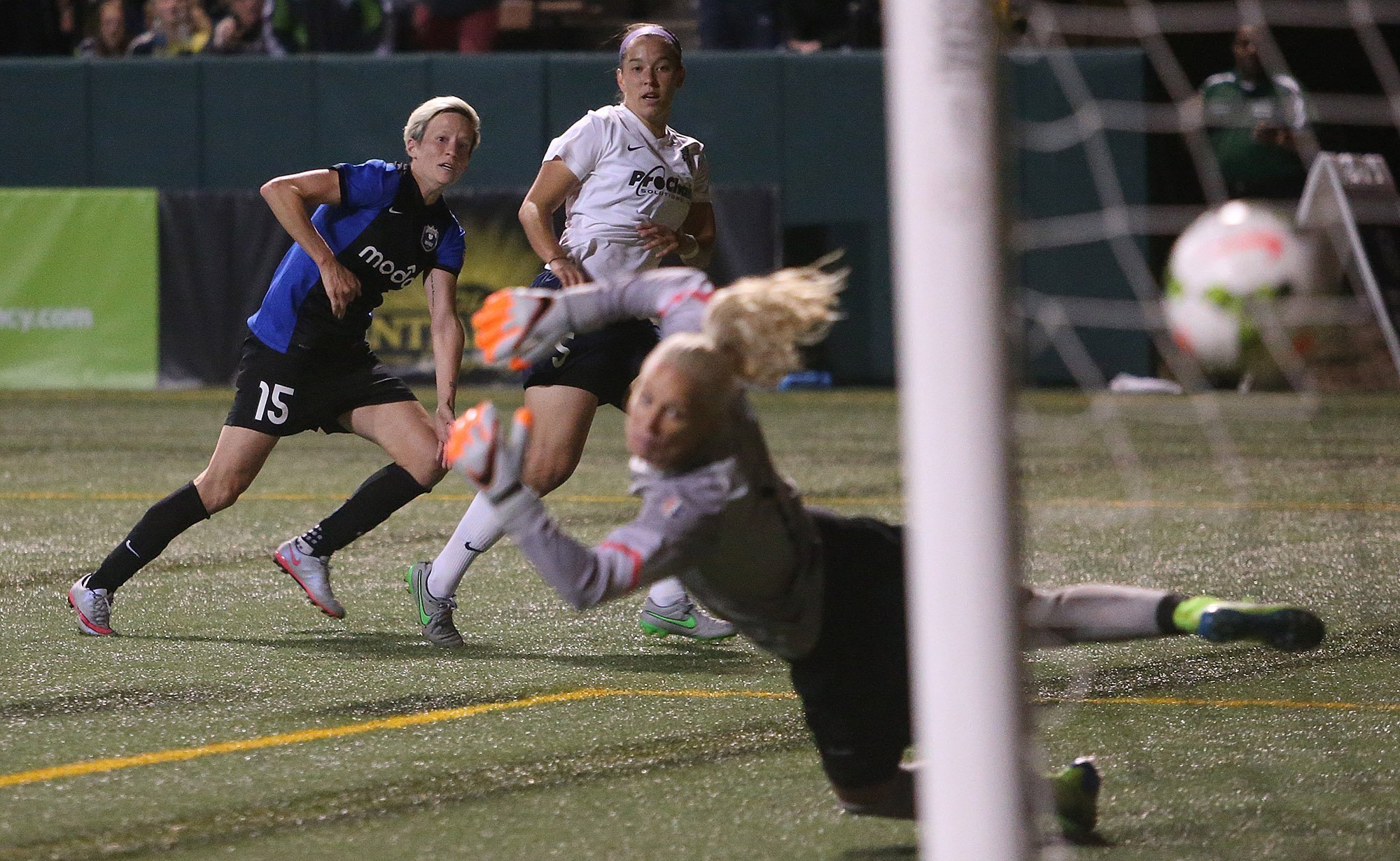  Seattle Reign's Megan Rapinoe score the second of what would be three goals during the National Women's Soccer League's Semifinal match between the Seattle Reign and the Washington Spirit at Memorial Stadium in Seattle, Sunday, September 13, 2015. S