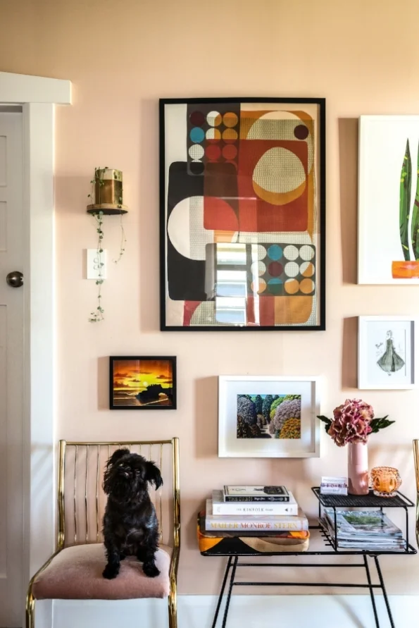 Image courtesy of NZ House and Garden magazine . Photo credit: Paul McCredie. This is the home of Michelle Matangi , with an eclectic and very personal art collection (and a really cute dog!).