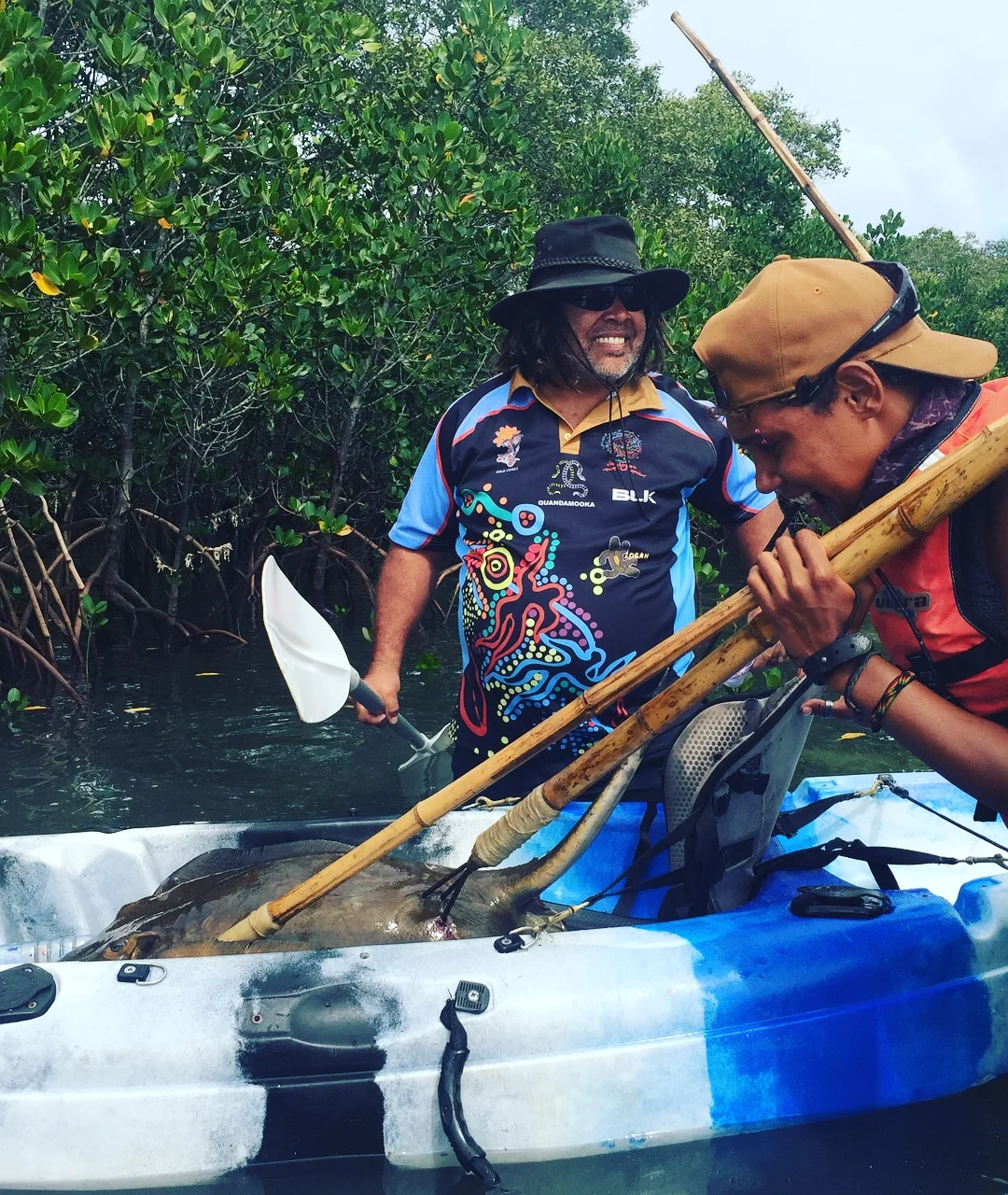  After James threw the spear, the stingray swam off into the mangroves - but Mark and his daughter retrieved it 