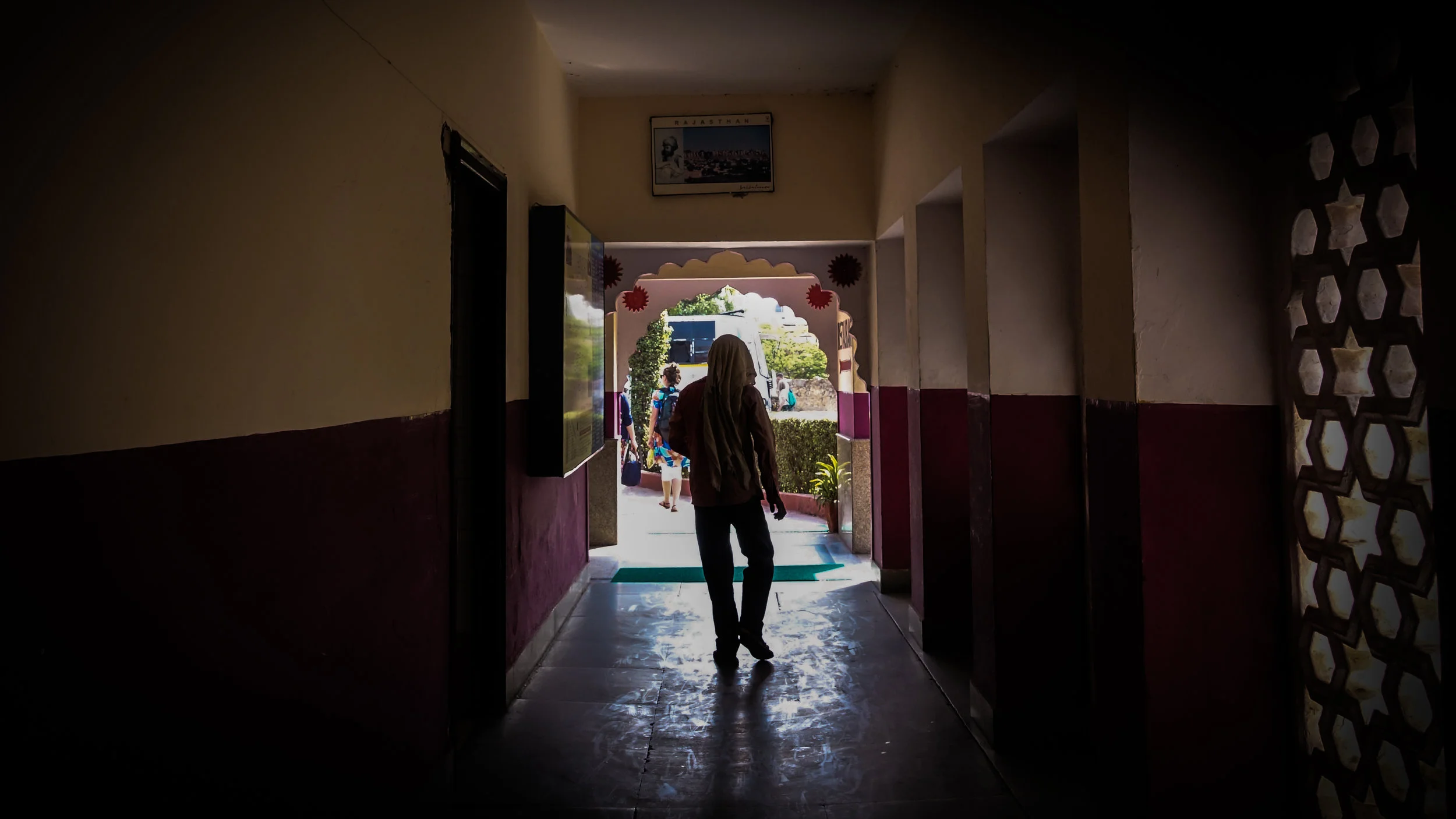 Man among cubicles in the outskirts of Rajasthan, 2017.