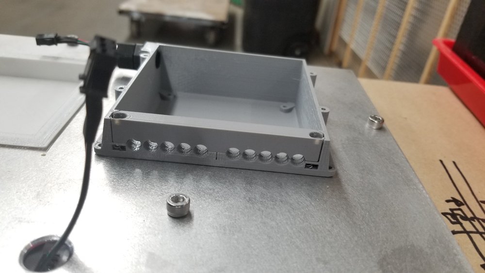 The 3D printed controller enclosure. Made to recess below the level of the backer panel and fit into the upper round of the digit in the 1’s place. 