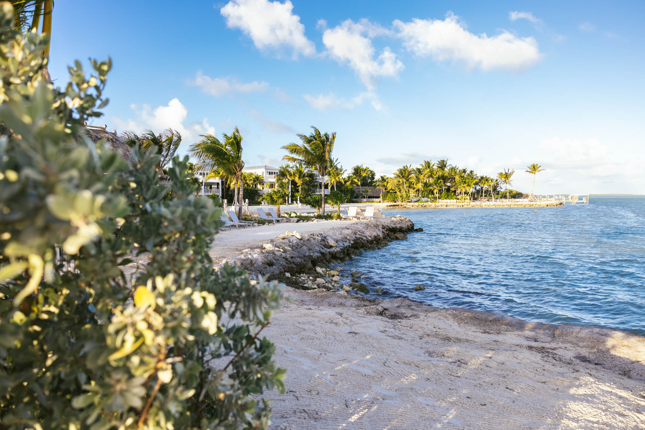  View of The Islands of Islamorada’s private beach and seating area. 