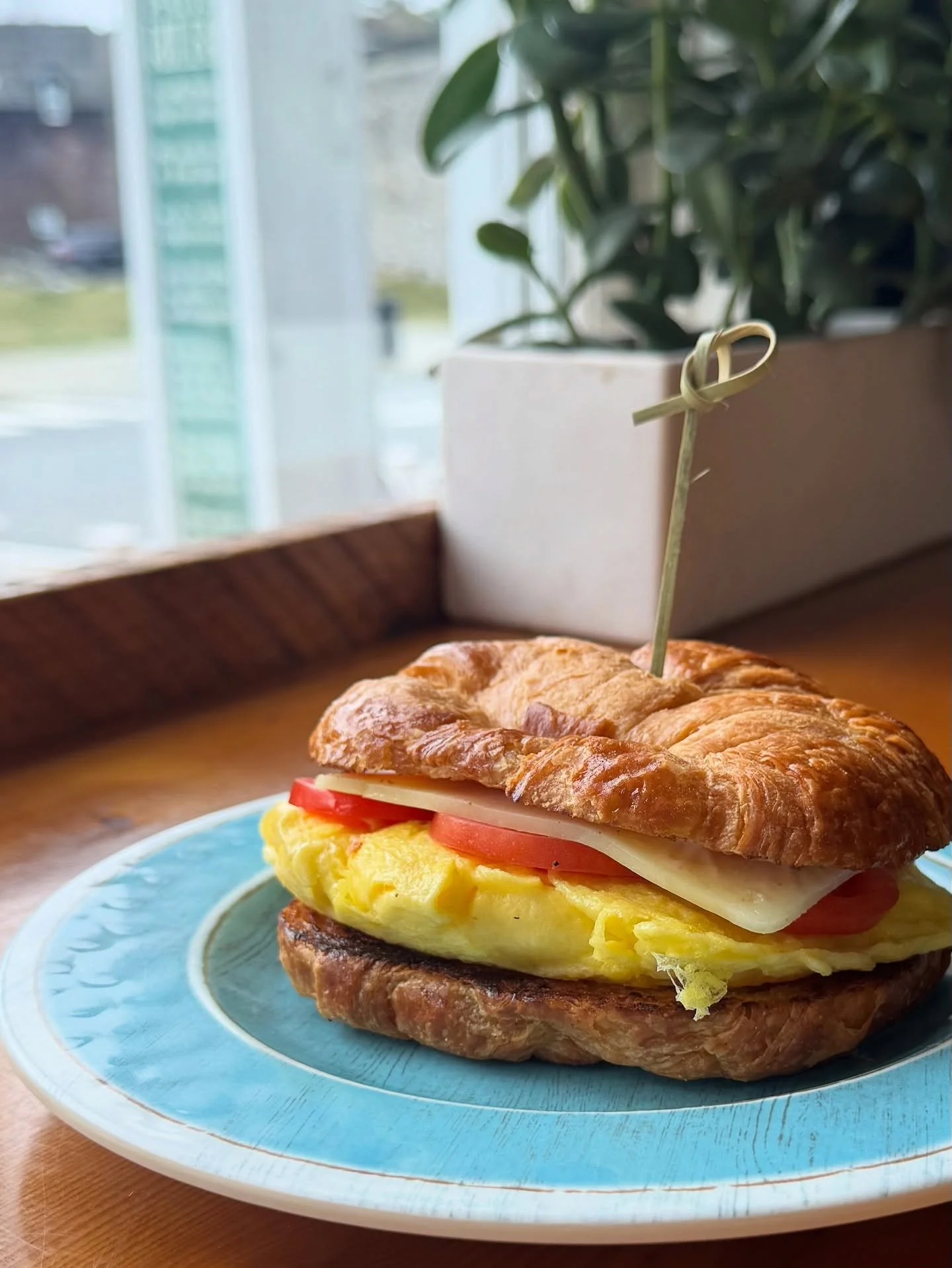 Can you keep a secret? 🤫 This glamour shot features the Smoky Eggwich, the best sandwich that&rsquo;s *not* on our menu. Two eggs, chipotle aioli, tomatoes, and Vermont cheddar served on a toasted croissant. It&rsquo;s so good, you&rsquo;ll want to 