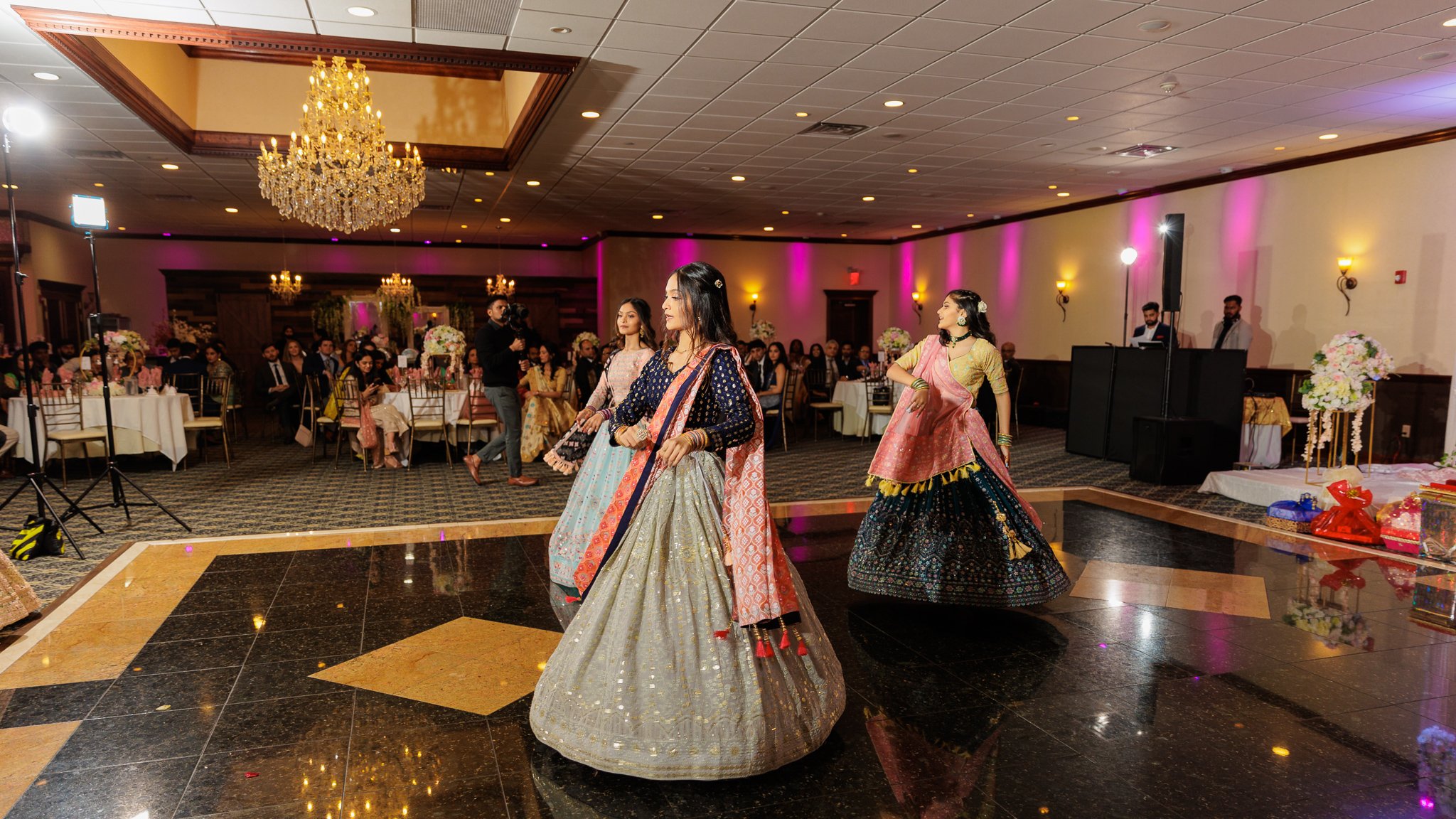 Indian girls dancing at engagement party