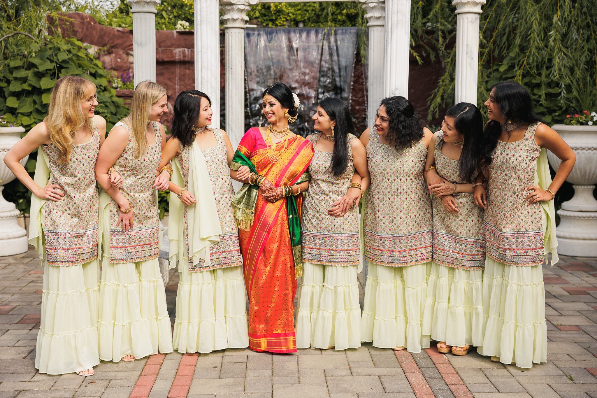 Group photo of bridesmaid in traditional Indian outfit