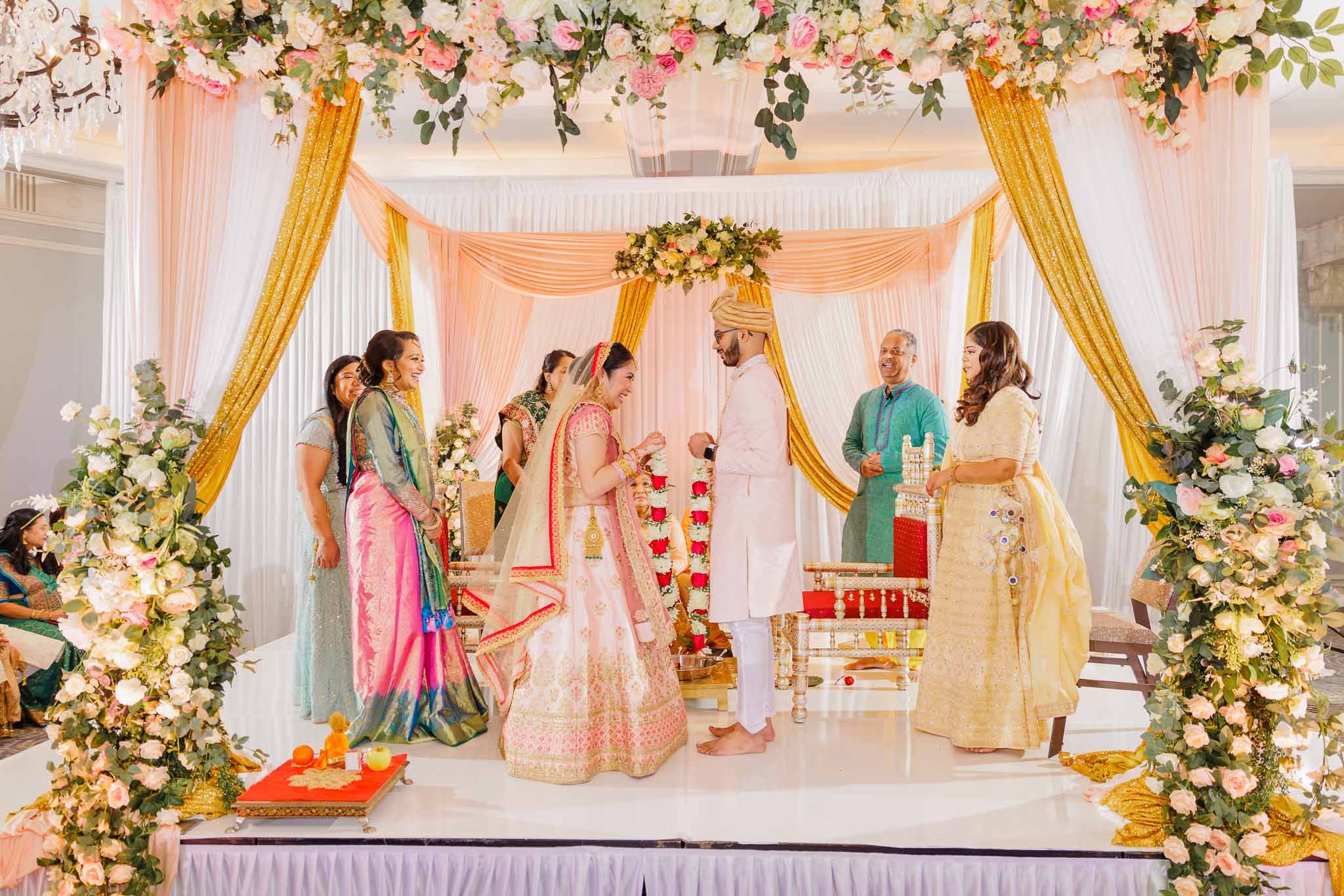 Indian bride and groom exchanging garlands. One of the wedding ritual of Indian wedding ceremony