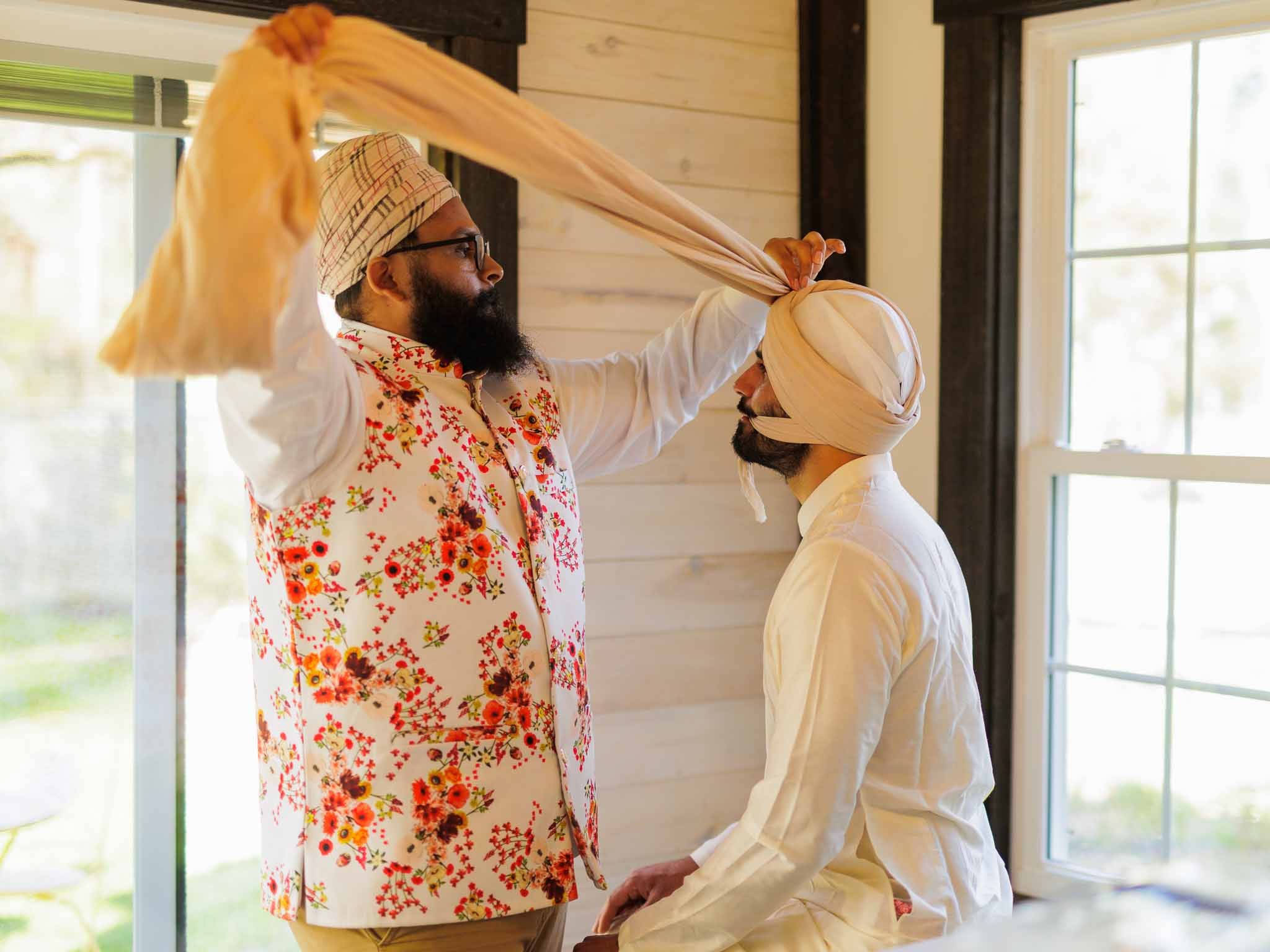 A Punjabi groom wearing a turban on his wedding day.