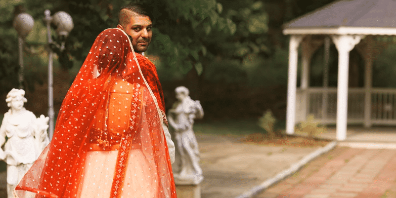  Emotional first look of an Indian bride and groom before their wedding ceremony 
