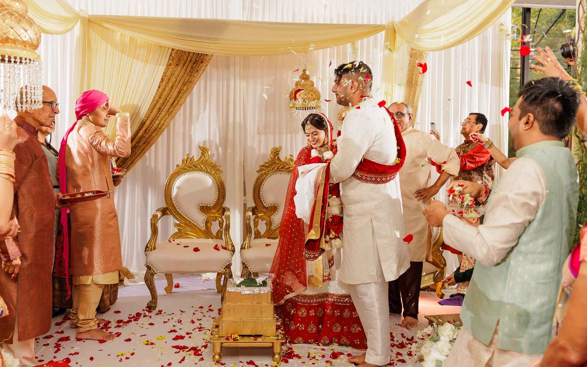  Indian bride and groom taking fera, a part of Indian wedding ceremoy 