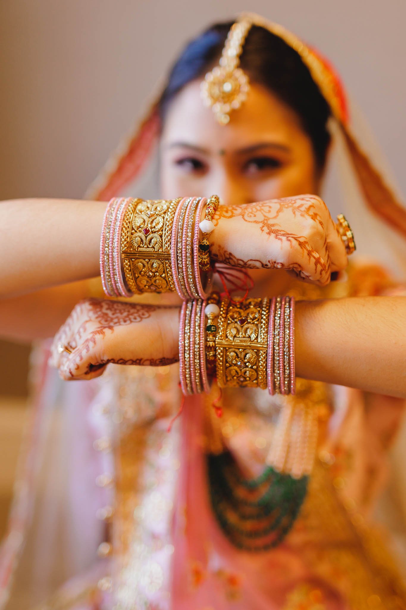 Indian bride showing hindu wedding bracelets