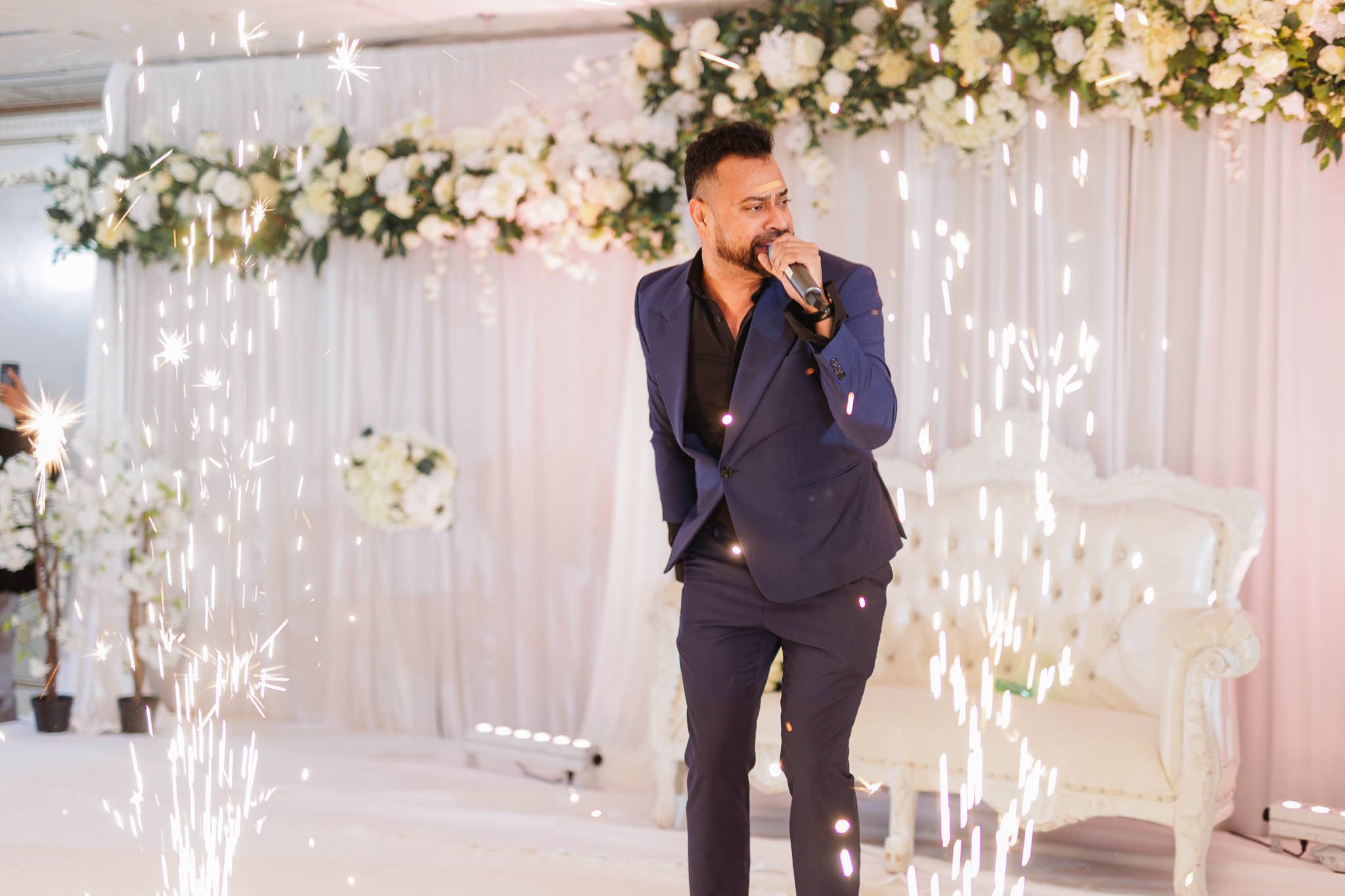 wedding singer Ravi B entertains guests in Royal Grand Manor