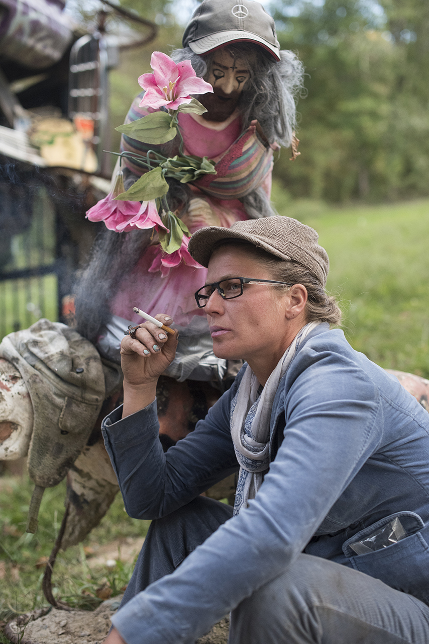 Trina Mcafee smokes a cigarette. She tells me about her kids that she doesn't see anymore, her struggle with Schizophrenia, Bi-Polar disorder, abuse, and homelessness. She says she is dressed for a job interview at a fire station, and that she's having a good day.