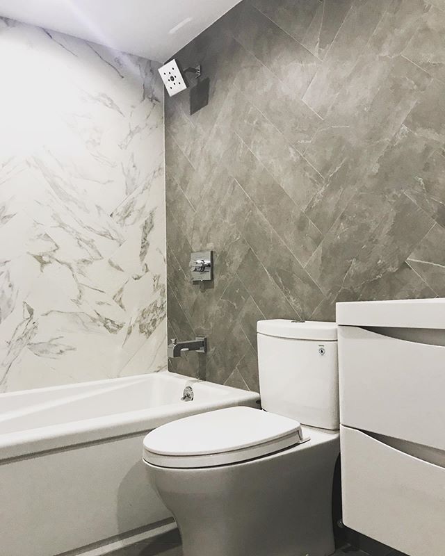 Basement bathroom with two color , same style tile. Modern finishes. #jbuildersny #bathroomdesign #brooklynconstruction design by @elbatdesign and work done by @jbuildersny