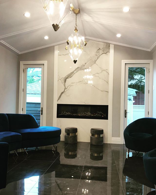 Beautiful family room extension just furnished with modern couches and lighting fixtures. #modern #jbuildersny #elbadesign @jbuildersny