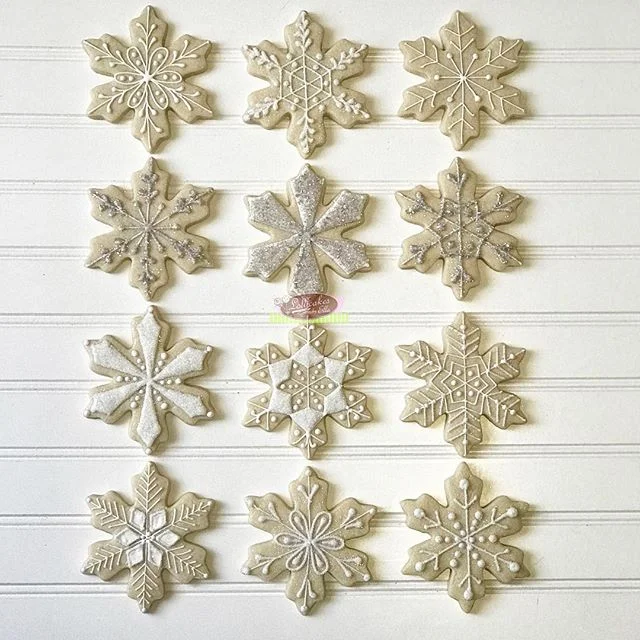 Winter Wonderland Snowflake Sugar Cookies and i think i am in love ❤️❤️❤️❄️❄️❄️ Wilton Snowflake cookie cutter came in handy and dusted with sanding sugar mixed with a little white jewel dust for that amazing sparkle #sugarcookie #sugarcookiesofinstagram #royalicingcookies #snowflakecookies #wintercookies #lollicakesbyella #jeweldust #cookies #christmascookies