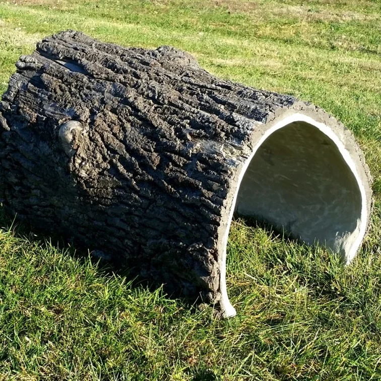 Crawl Thru Log Dimensions: 48″ x 36″ x 30″ Age Group: All Color: Natural Oak This crawl-thru log with authentic bark re-creation is the perfect tunnel for your natural-themed playground. Use one or multiple to create a unique play space for children of all age groups.