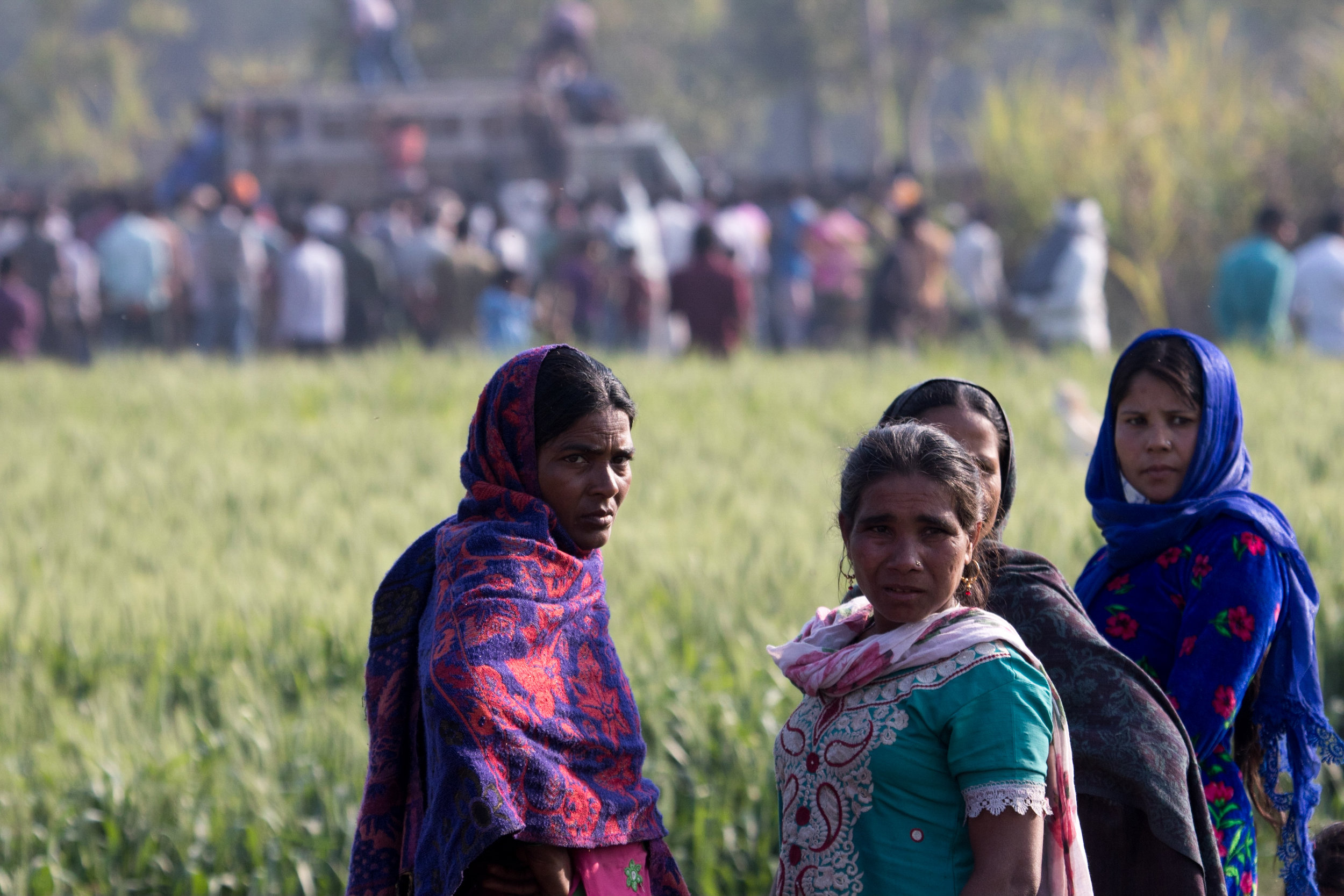 A few women watched the action from a safe distance.