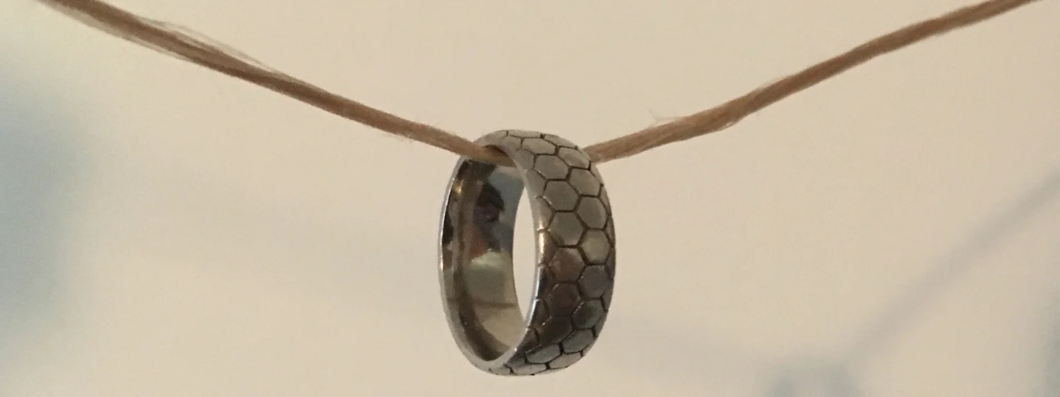 The mechanical bond is an entanglement in space between component parts that are not otherwise bonded. One example of a system with a mechanical bond is a bead on a string. We thread extremely tiny beads onto extremely tiny strings to create nanomaterials and micromaterials with unusual and potentially functional properties.