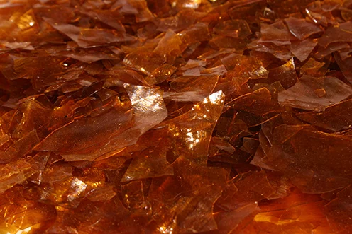 Photo: Red shellac flakes