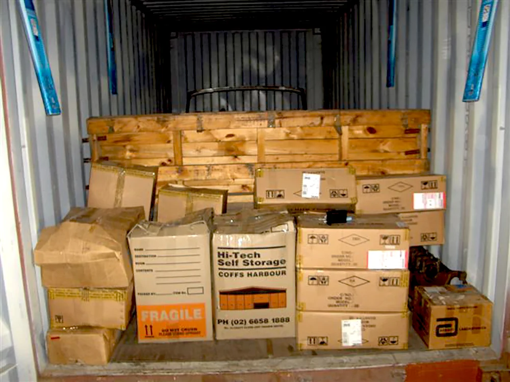 Photo: 1943 Alfa Romeo 6C 2500 with parts in boxes in the container being shipped from New Zealand to Chicago. Photo courtesy of David Cooper.